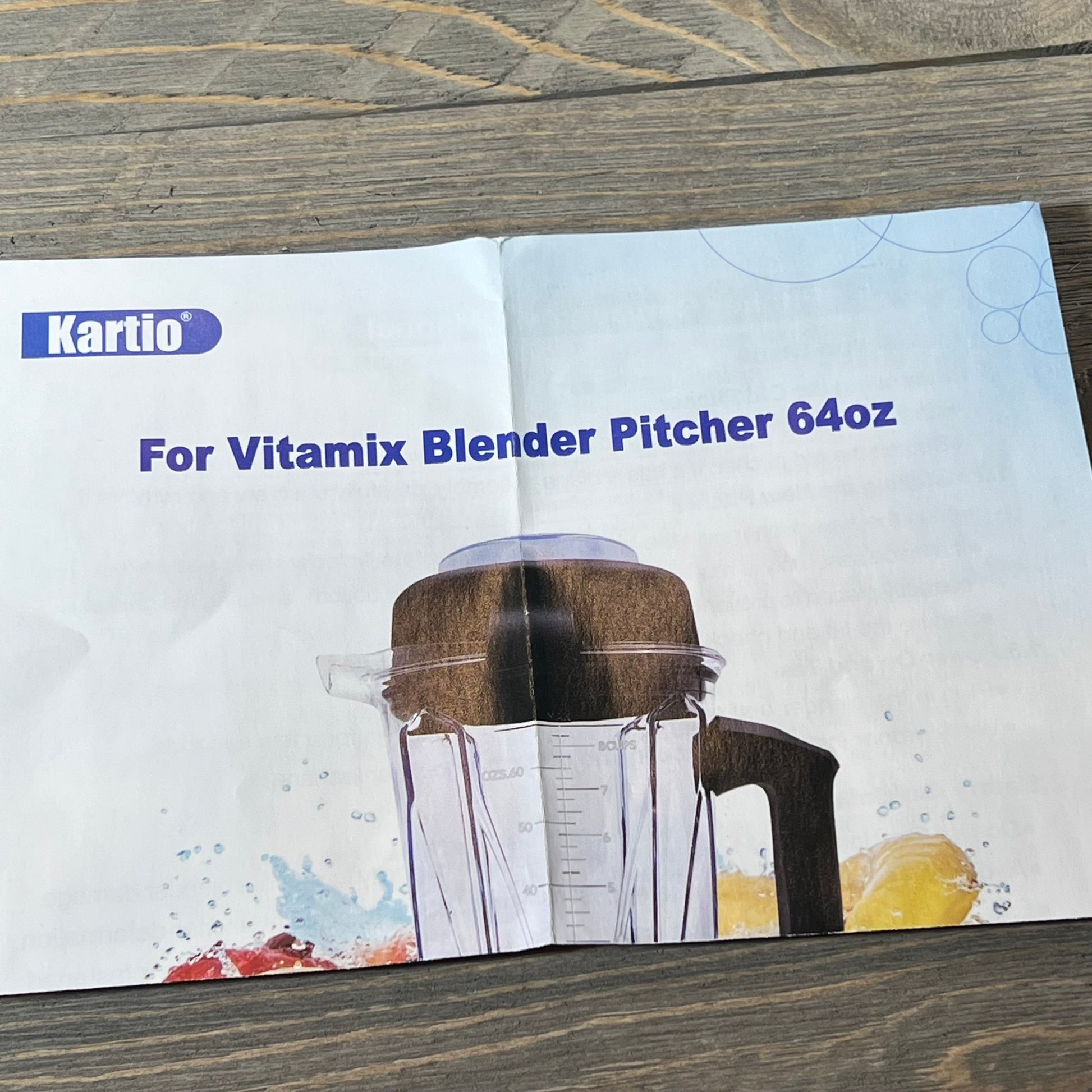 64oz blender pitcher compatible with Vitamix 5200, shown with clear measurement markings and black lid.