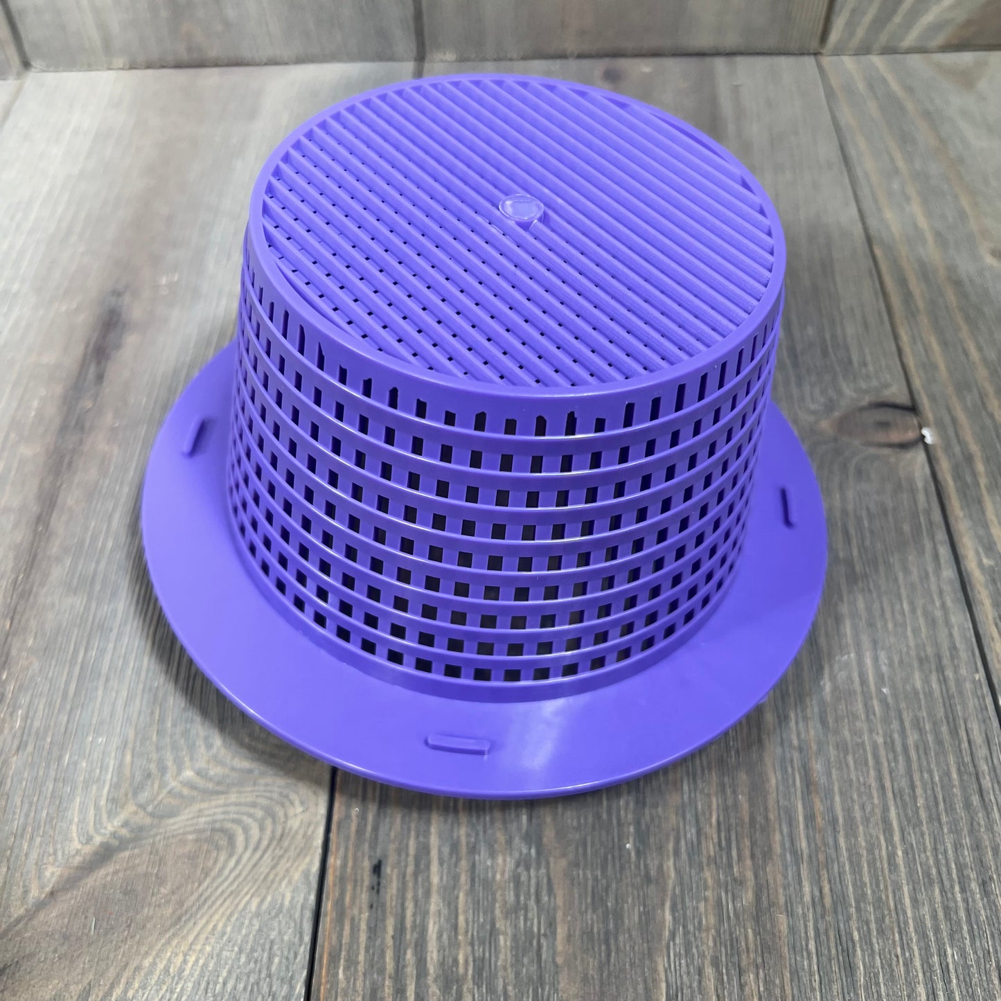 Purple pool skimmer basket with handle, 6.18-inch top diameter, on wooden surface.