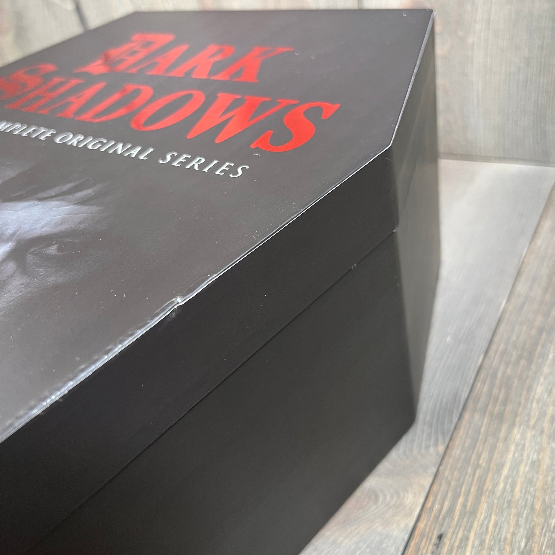 Dark Shadows: The Complete Original Series Deluxe Edition DVD set in a black box with red text.