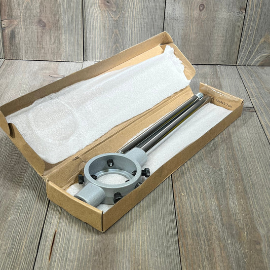 Round die stock handle wrench in open cardboard box, designed for 36mm-55mm metric dies, ideal for M24-M27 threading tasks.