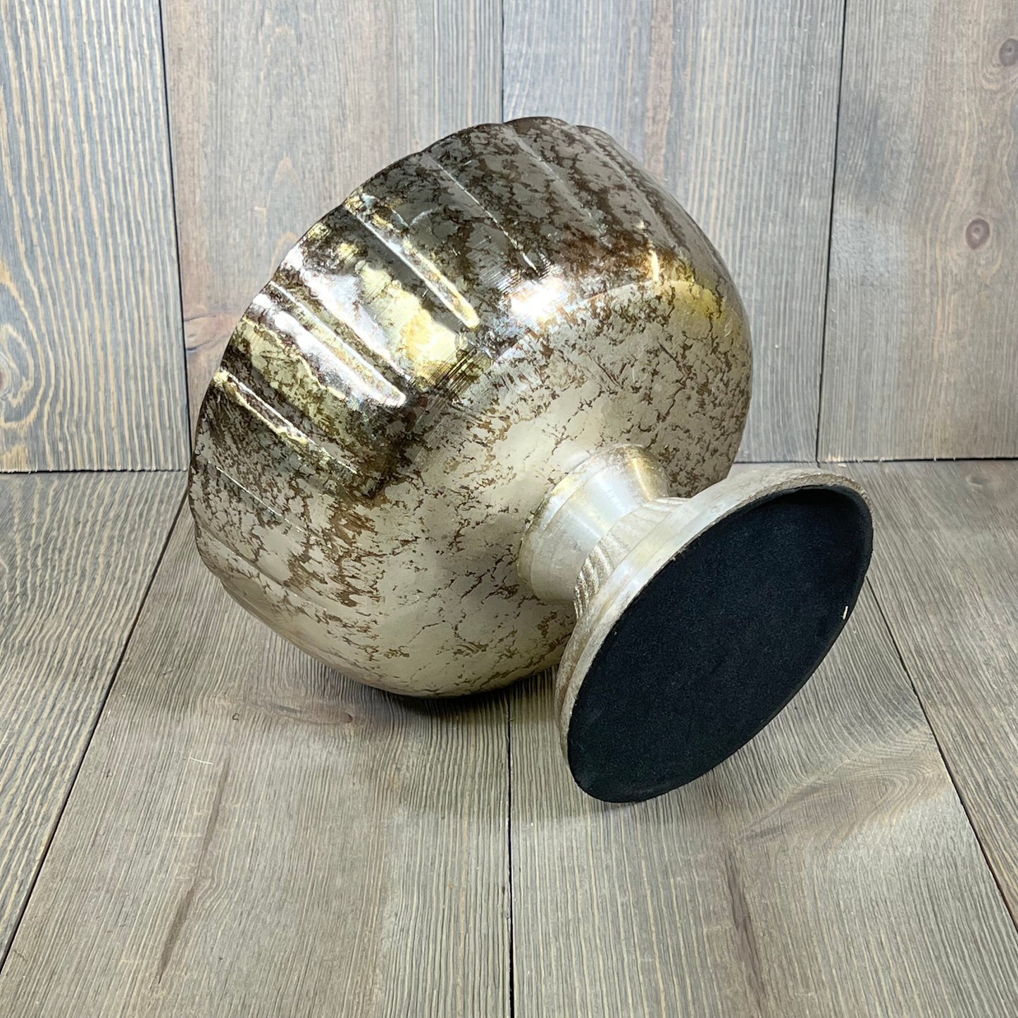 Distressed champagne metal compote bowl with elegant fluted design, perfect for indoor and outdoor event decor.