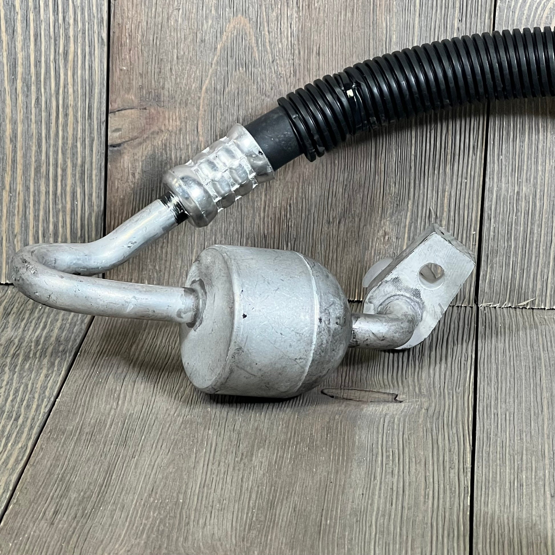 A-Premium A/C discharge line hose assembly for Ford Explorer 2013-2019, featuring durable metal fittings and flexible hose design.