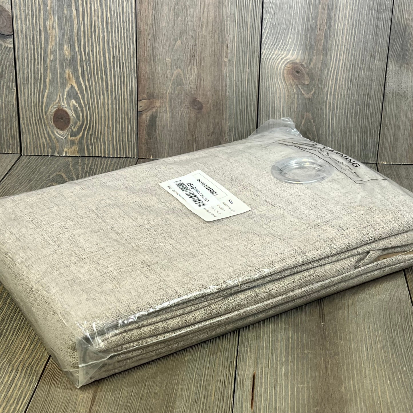 Joydeco blackout room divider curtain in packaging, showcasing linen texture, ideal for sliding doors and privacy in living rooms.