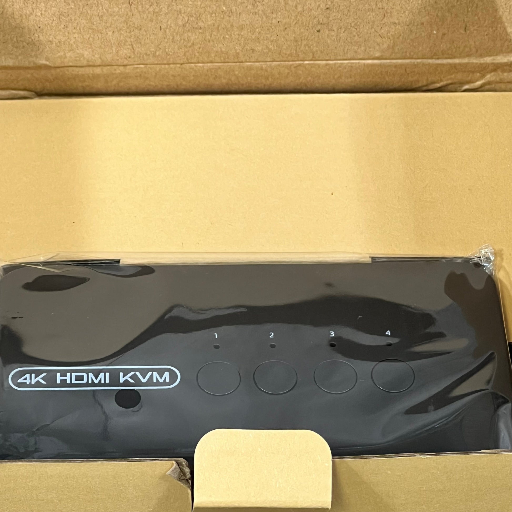 4K HDMI KVM switch in box, featuring 4 ports for connecting multiple computers to one monitor, supports 4K@30Hz display.