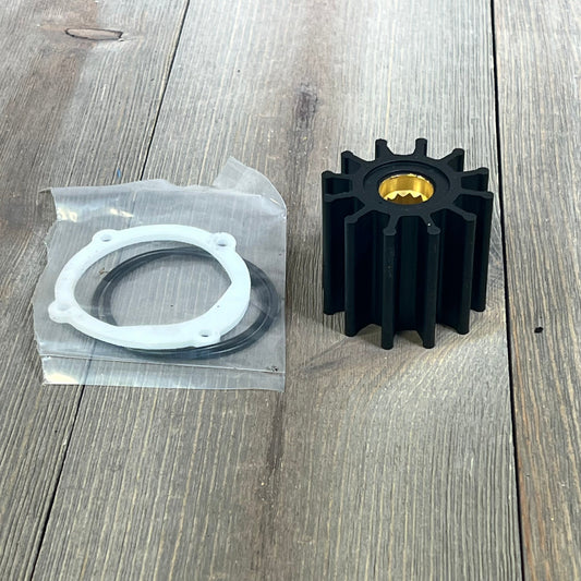 Water pump impeller repair kit for Johnson and Yanmar, featuring black impeller and gasket on wooden surface.