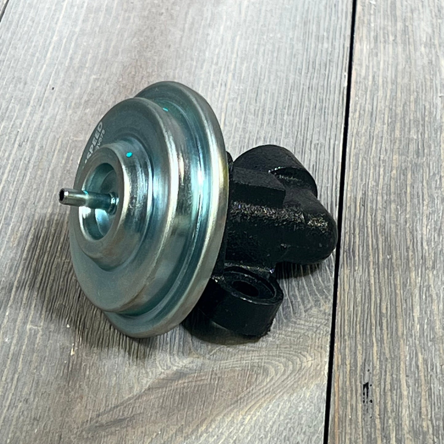 CARMOCAR EGR Valve EGV575, metal and black, replacement for Ford F-150, enhancing engine performance and efficiency.