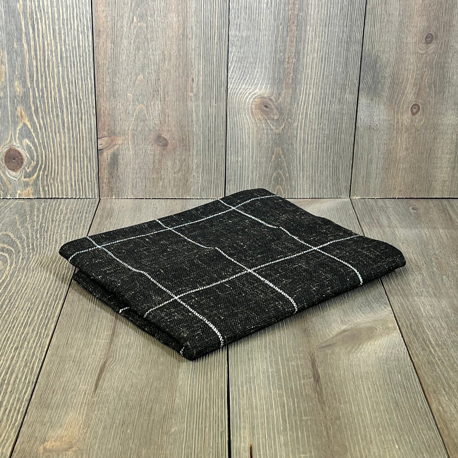 Black boho lumbar pillow cover 14x36 with a chic plaid design, perfect for farmhouse decor on beds or couches.