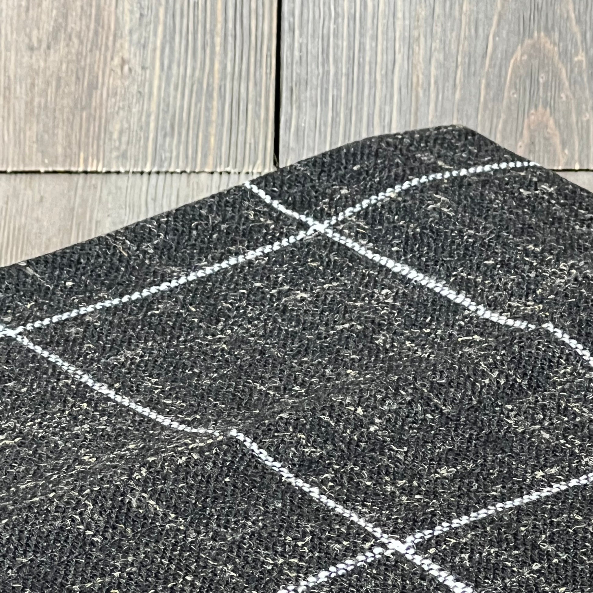 Black boho lumbar throw pillow cover with white grid pattern, 14x36 inches, farmhouse style for bed or couch.