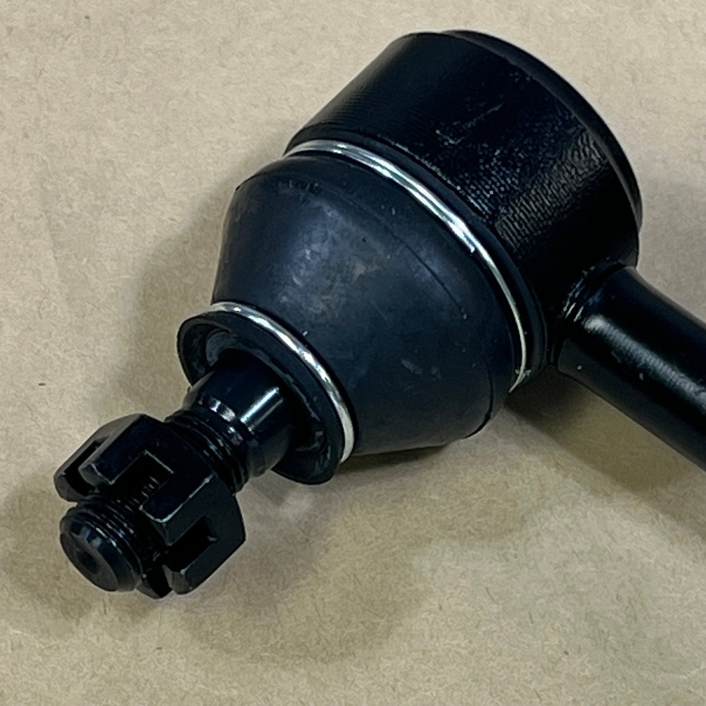 Close-up of DEARMMGG front sway bar link for Dodge Ram 1500, showing the durable black metal construction.