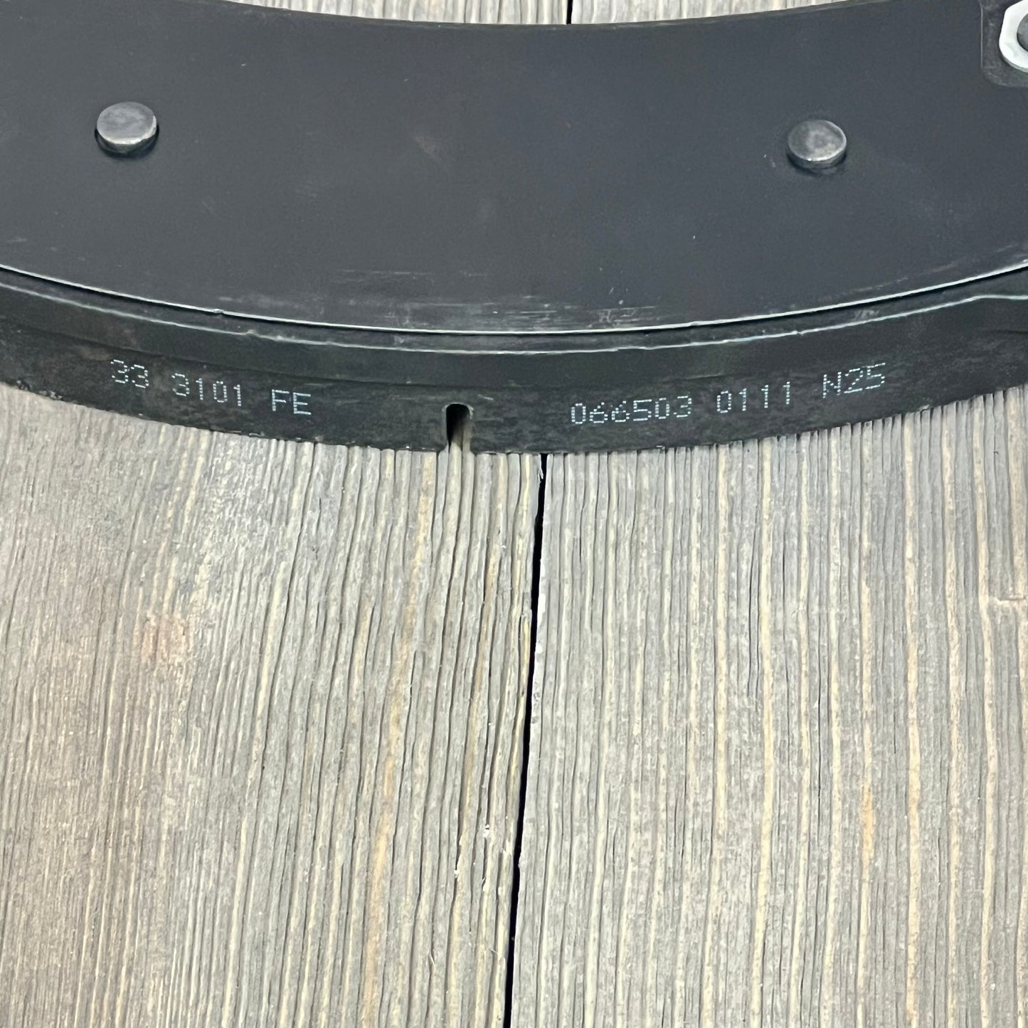 Close-up of ECCPP rear ceramic disc brake pad for Chevrolet Suburban and Silverado models, showcasing durability.