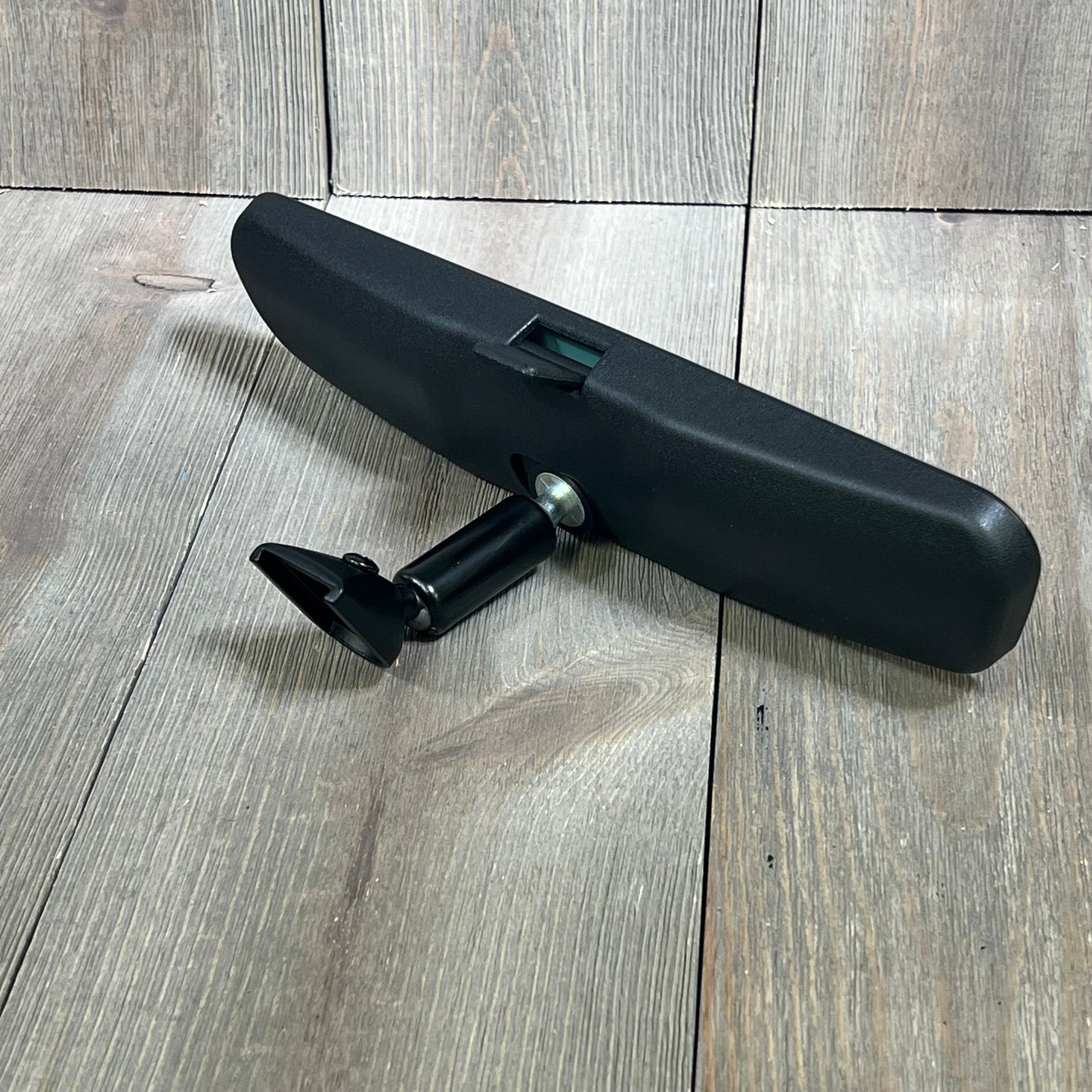 Interior rearview mirror replacement for Mazda 3, CX-3, CX-5, MX-5, OEM # KD53-69-220B, sleek design on wooden background.