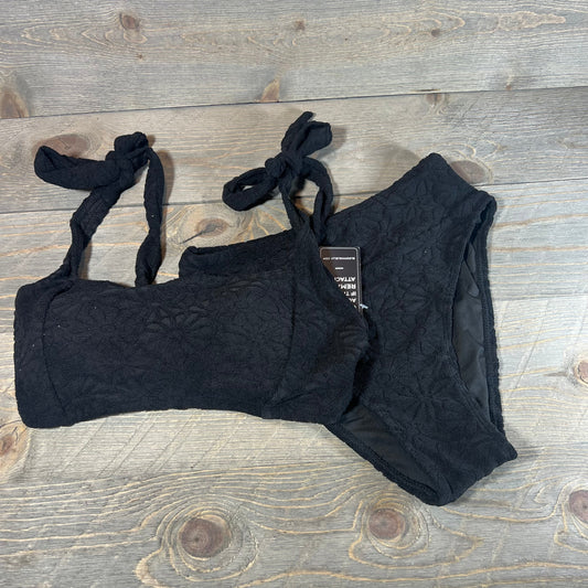 Black high waisted bikini set with floral texture, featuring adjustable straps, size small on wooden background.