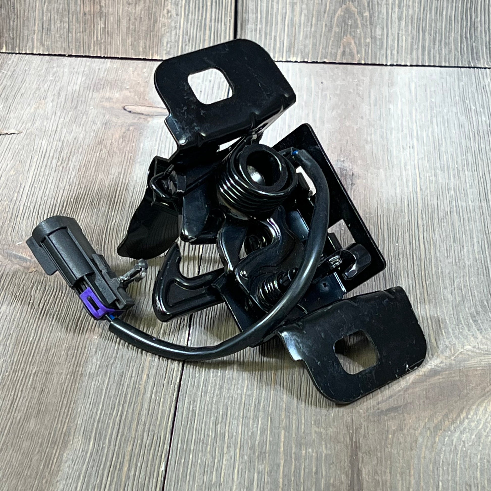 Durable black hood latch for 2015-2018 Chevy Tahoe, GM1234115, essential for secure hood closure.