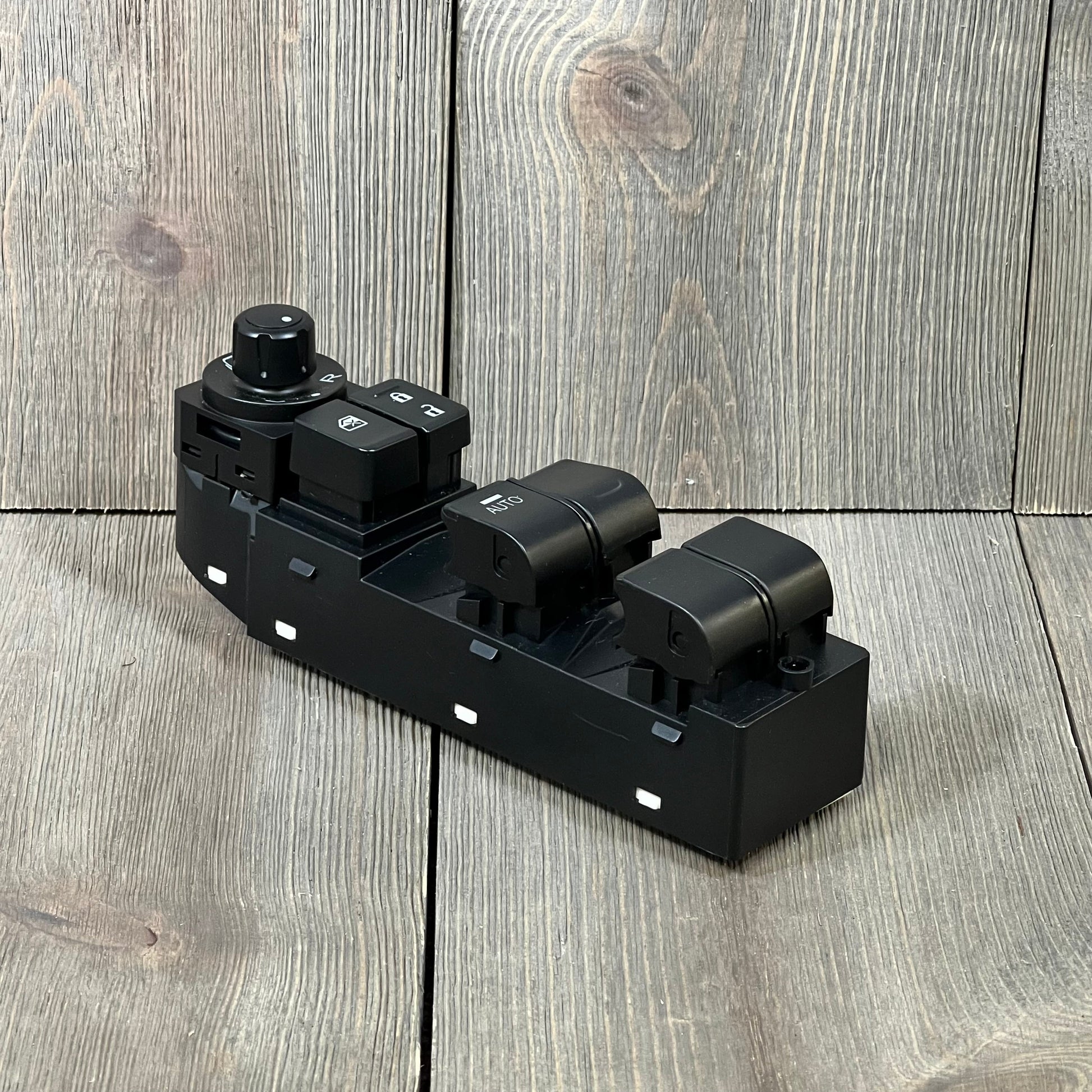 Automatic power window switch for Mazda CX-5 L4 2013-2016, driver's side, with 14+12 pins on a wooden background.