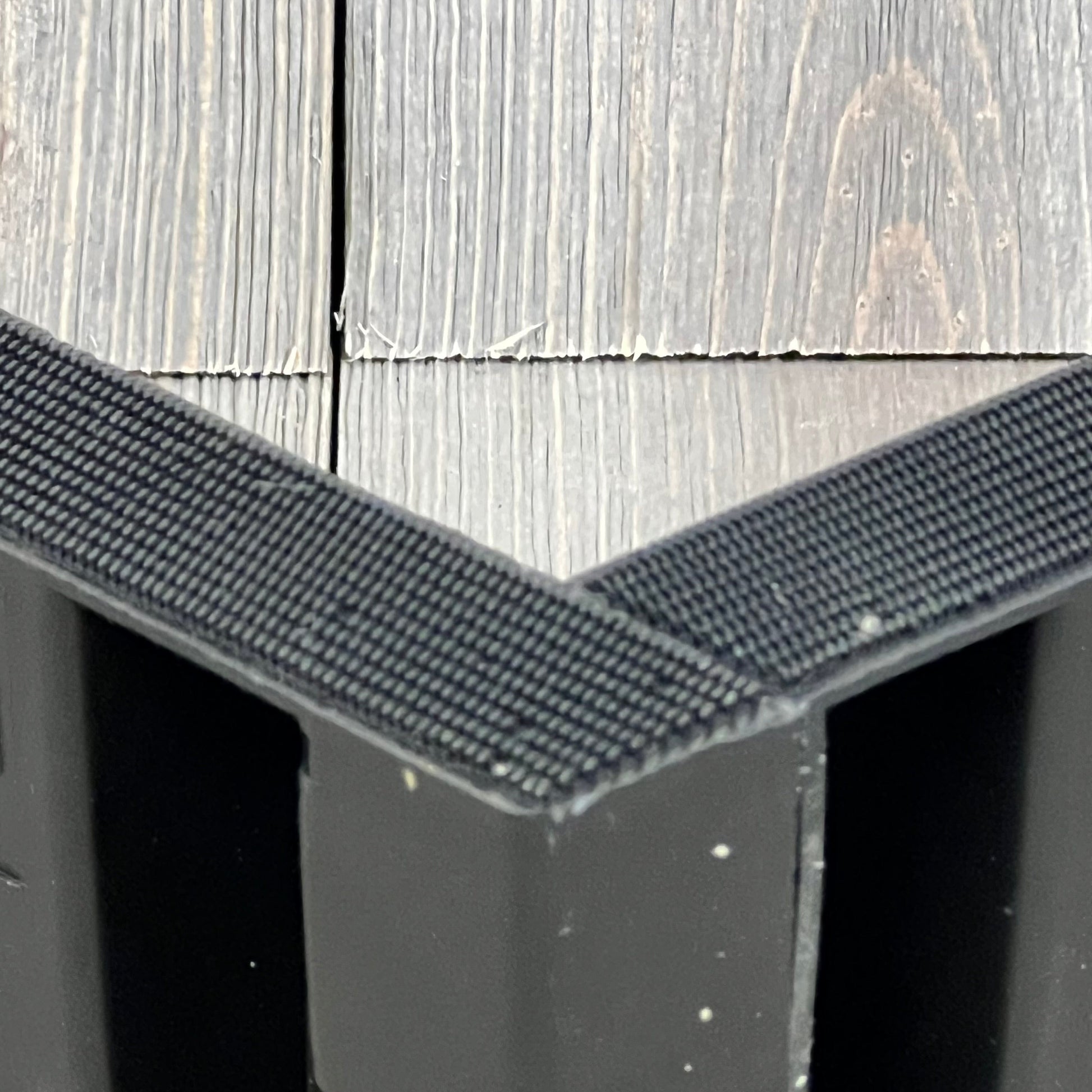 Close-up of Datanly car trunk organizer block, showcasing durable black material and secure grip for SUV cargo storage.