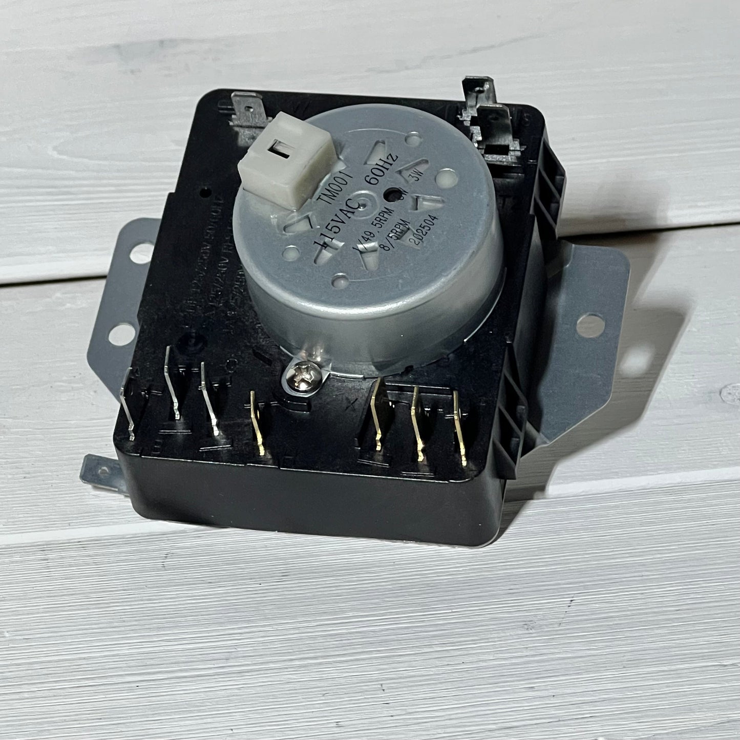 Dryer timer 1048553842-W10185981 with metal gear, compatible with Whirlpool and Kenmore, on white background.
