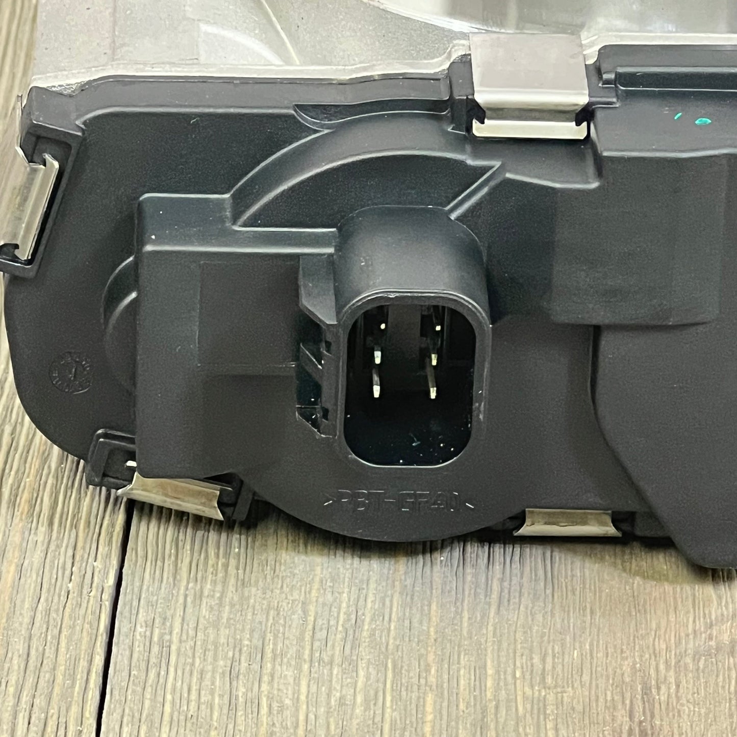 Close-up of TUCAREST electronic throttle body assembly, showcasing 6-pin male connector for Buick and GMC models.