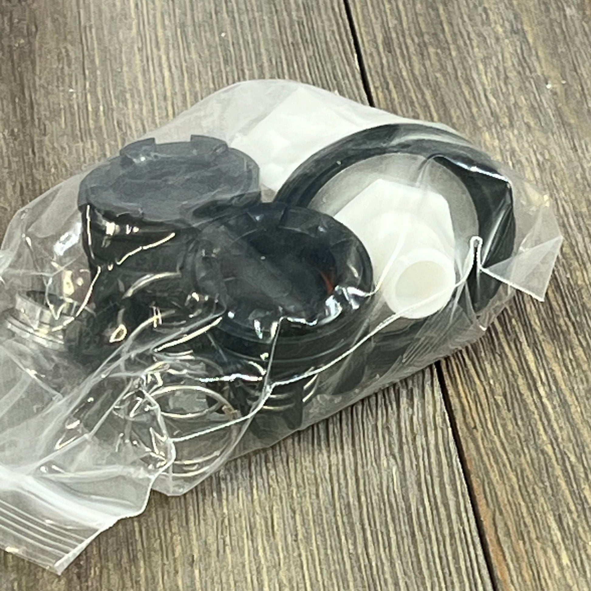 Repair kit components for 3/4" Reduced Pressure Zone Assembly, including relief valve, check valves, and retainer.