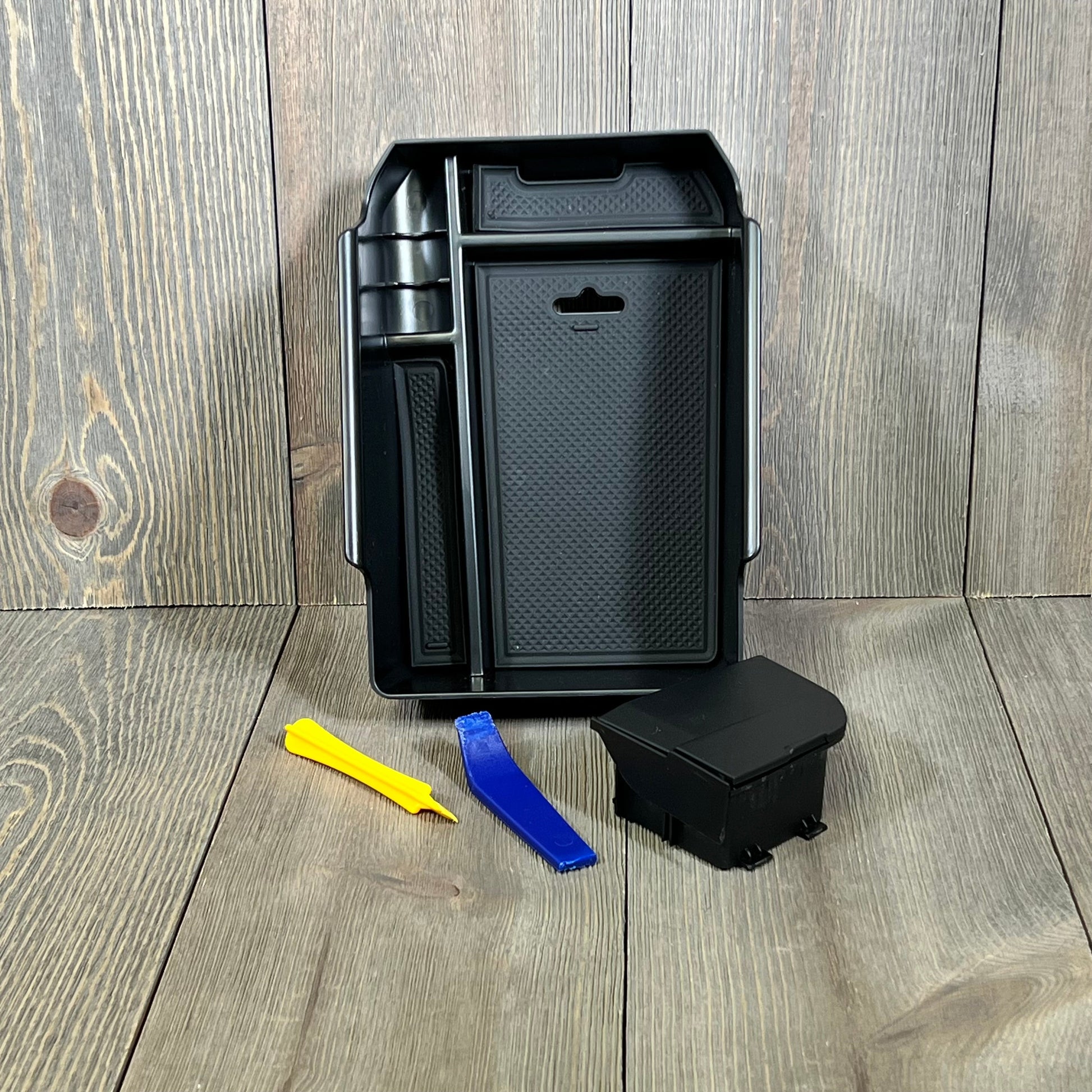 Center console organizer tray for BMW X3 X4 2019-2023 with hidden storage box and installation tools shown on wooden background.