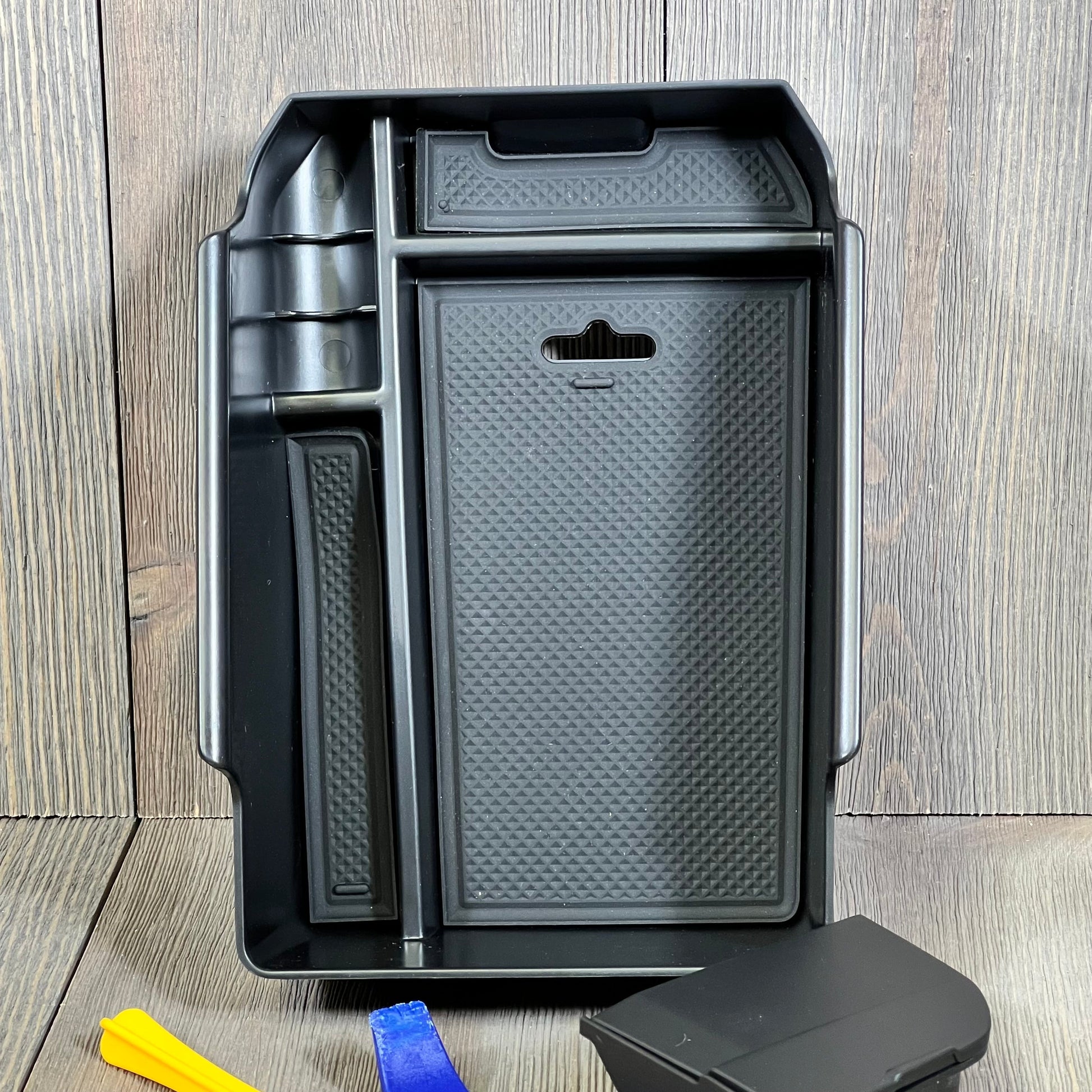 Center console organizer tray for BMW X3 X4 2019-2023 with hidden storage, enhancing car interior space.