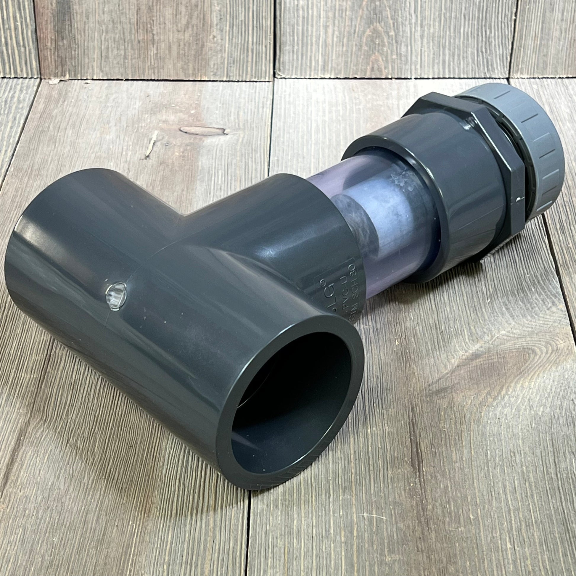 Inline zinc anode for saltwater pools, featuring a durable 2-inch PVC construction, ideal for corrosion protection.