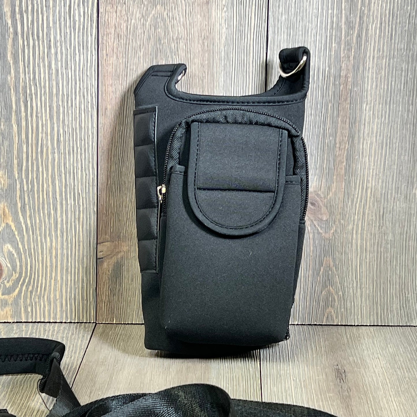 Black magnetic water bottle carrier bag with detachable shoulder strap and storage pouches, fits 40oz Stanley Cup.