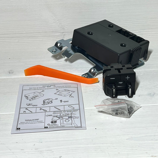 Trailer Brake Control Module Switch kit for Ram 1500-5500, includes installation guide and mounting hardware.