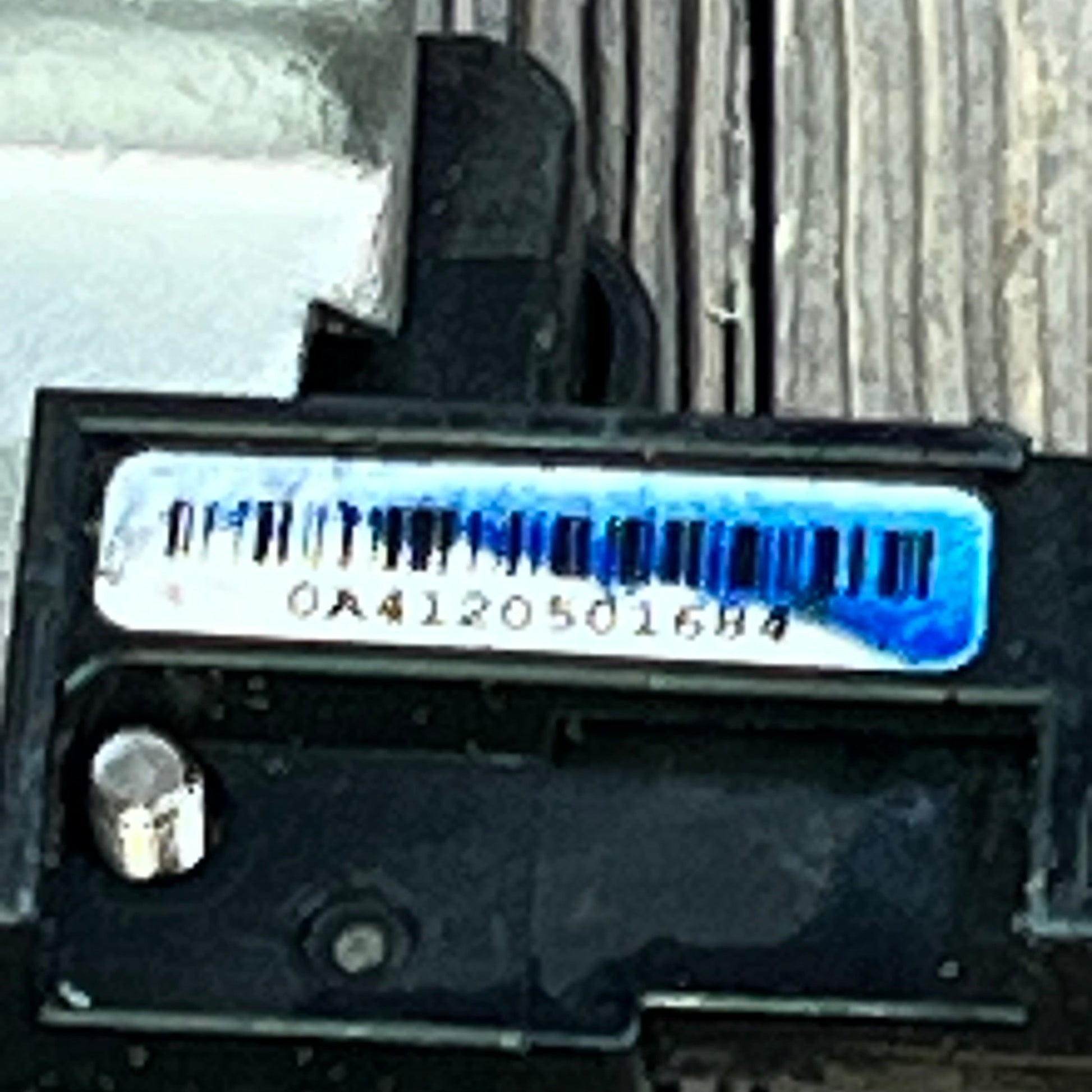 Close-up of 1046021498 battery sensor barcode for Honda Accord 2013-2017, Acura RLX 2014-2017.