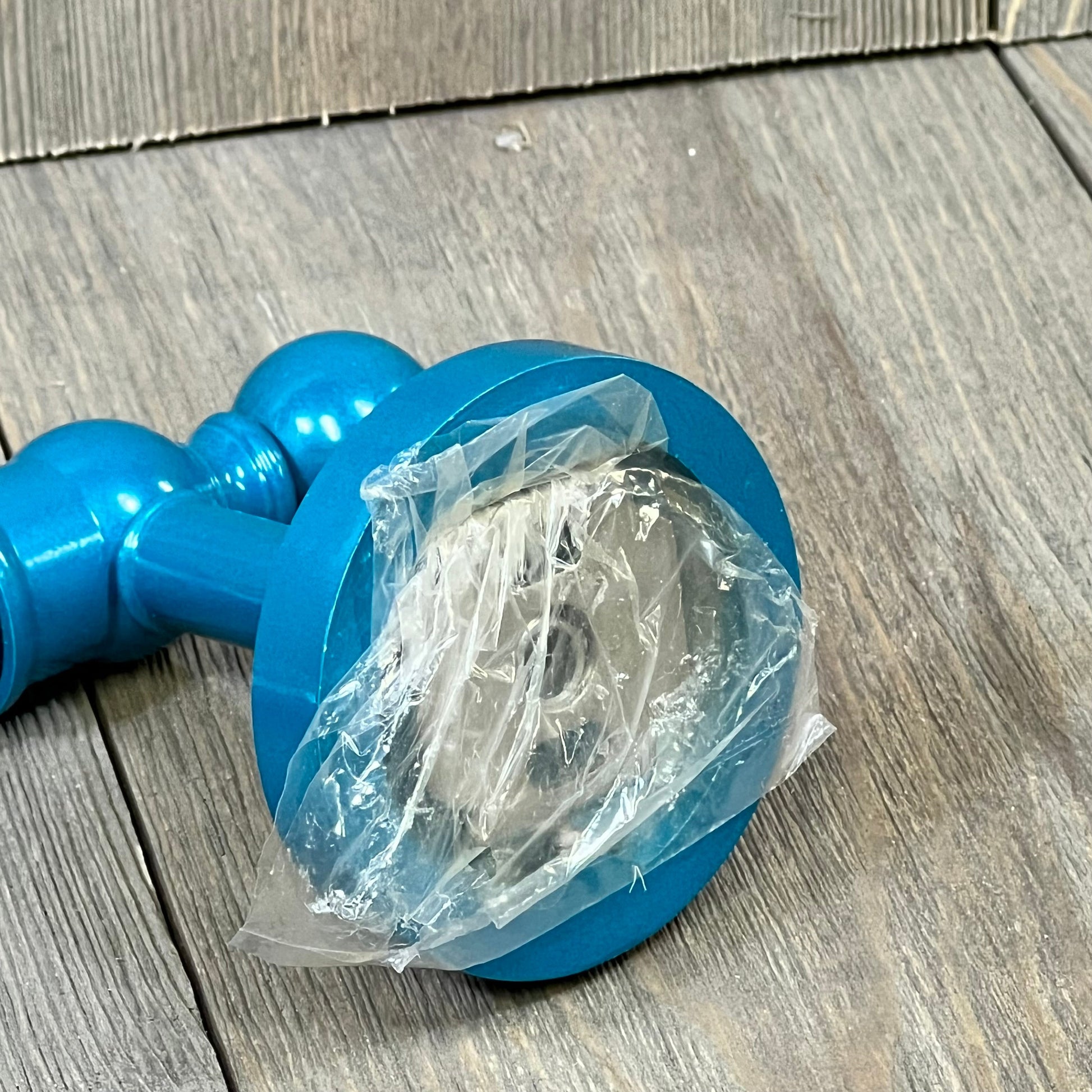 Glokzin Teal towel bar end cap from the Allied Brass Skyline Collection, showcasing vibrant color and craftsmanship.