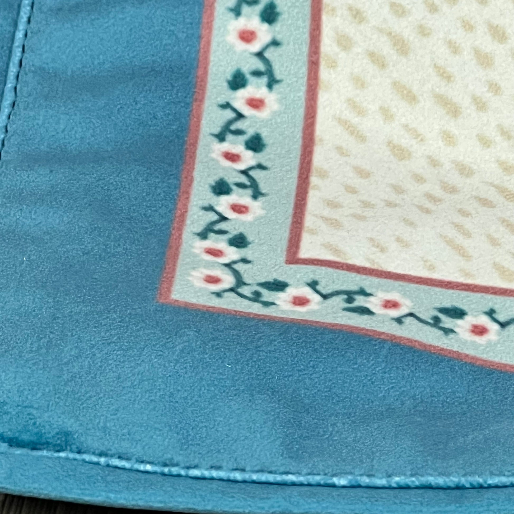 Elegant floral velvet table runner with beige and pink wildflower design, perfect for enhancing dining decor.