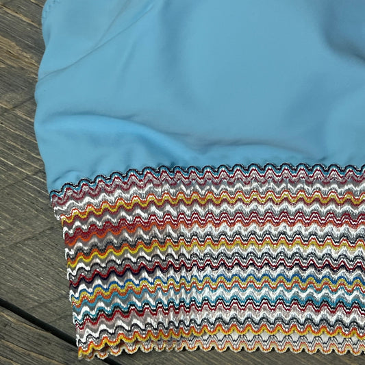 Blue high-waisted bikini bottom with colorful zigzag pattern, Blooming Jelly, size M, tummy control feature.