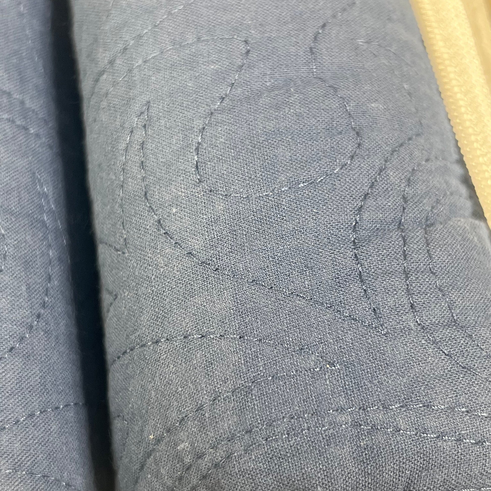 Navy blue floral quilted pattern on WINLIFE king-size cotton pillow sham, showcasing intricate stitching detail.