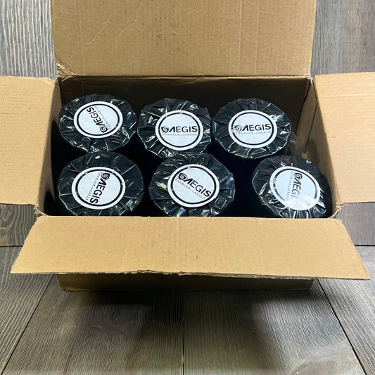 Box of Aegis Adhesives compatible label rolls for Brother DK-1209, showcasing 12 rolls ready for QL label printers.