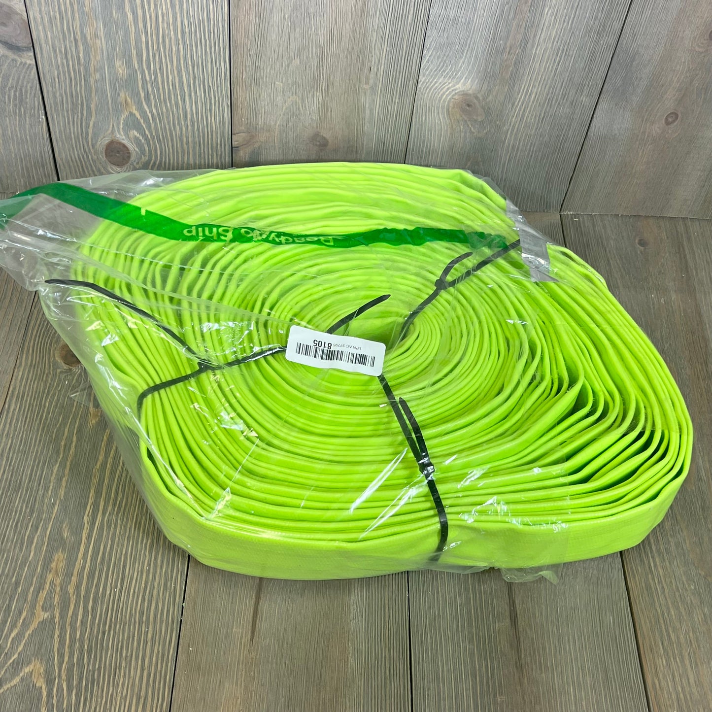 Heavy-duty green pool backwash hose in packaging, 1-1/4" x 100 FT, includes two clamps for swimming pool drainage.