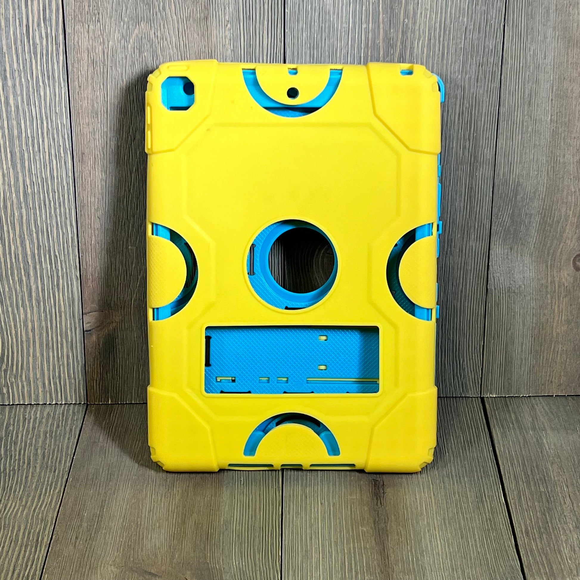 Rugged gold ZoneFoker iPad case for 9th/8th/7th Gen, showcasing heavy-duty shockproof design with kickstand.