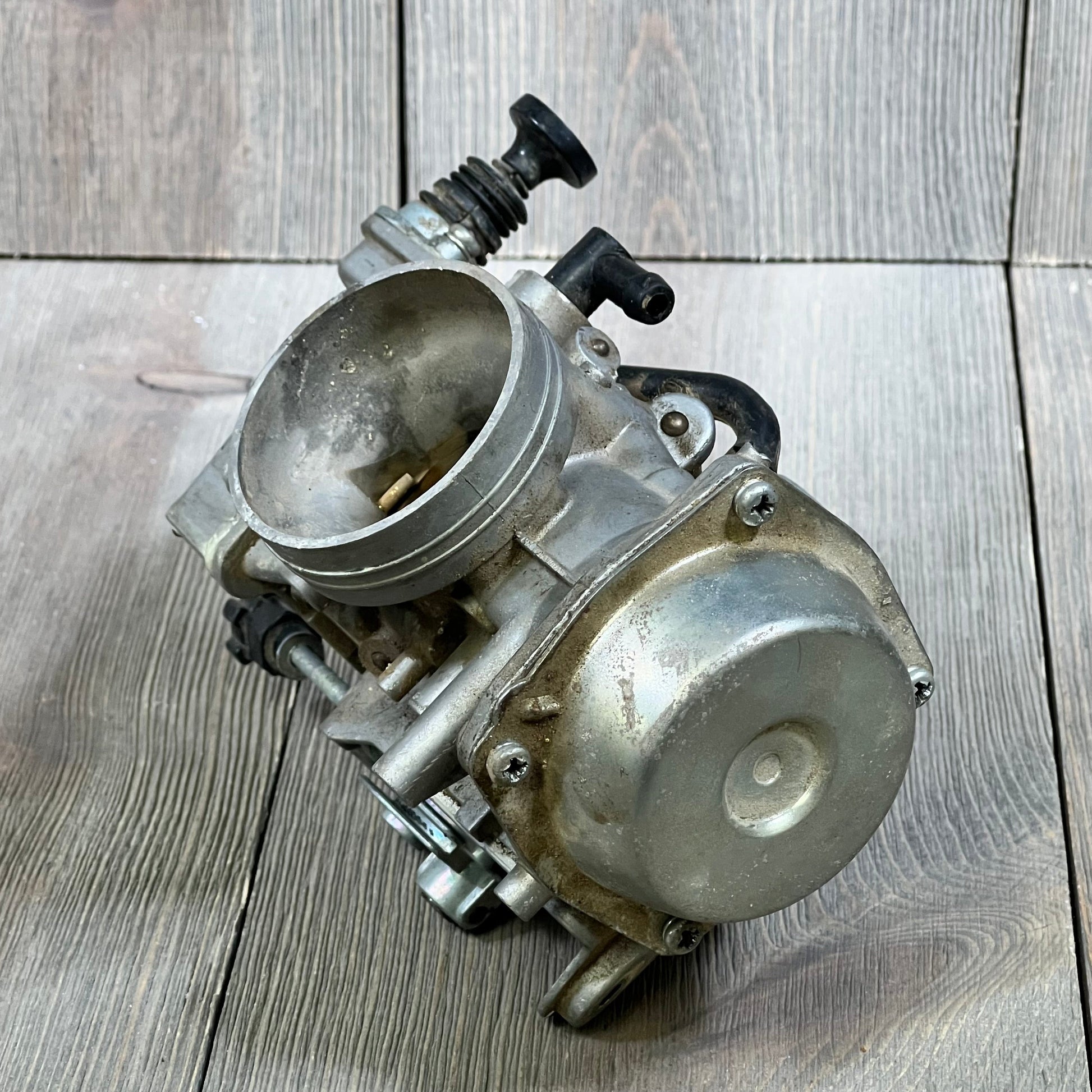 Carbhub TRX300 carburetor angled view, showcasing metal construction for Honda 300 Fourtrax 1988-2000.