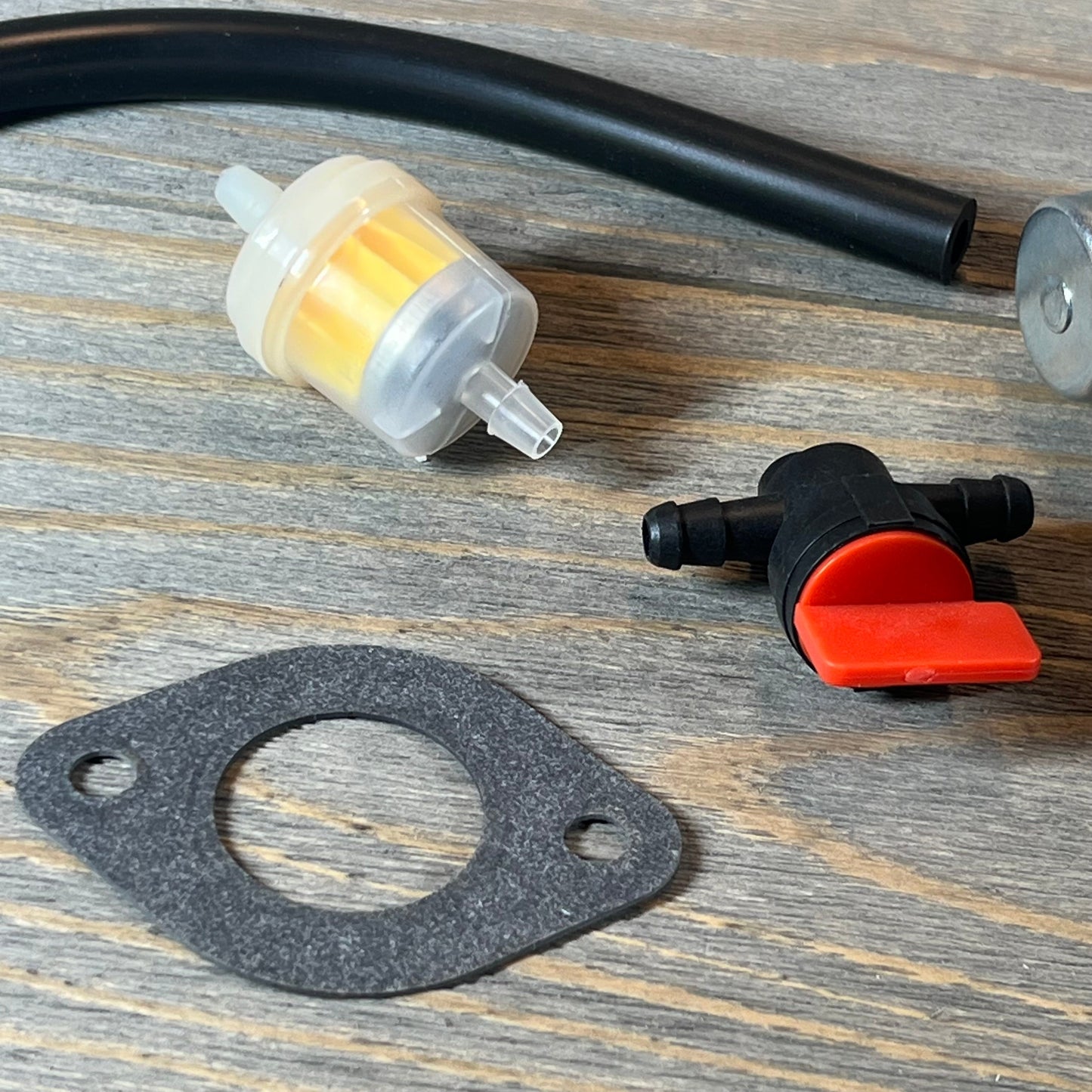 Carburetor components for 1059372319-CARBBIA, including filter and gasket, suitable for 40N877 Intek Engine Mower.