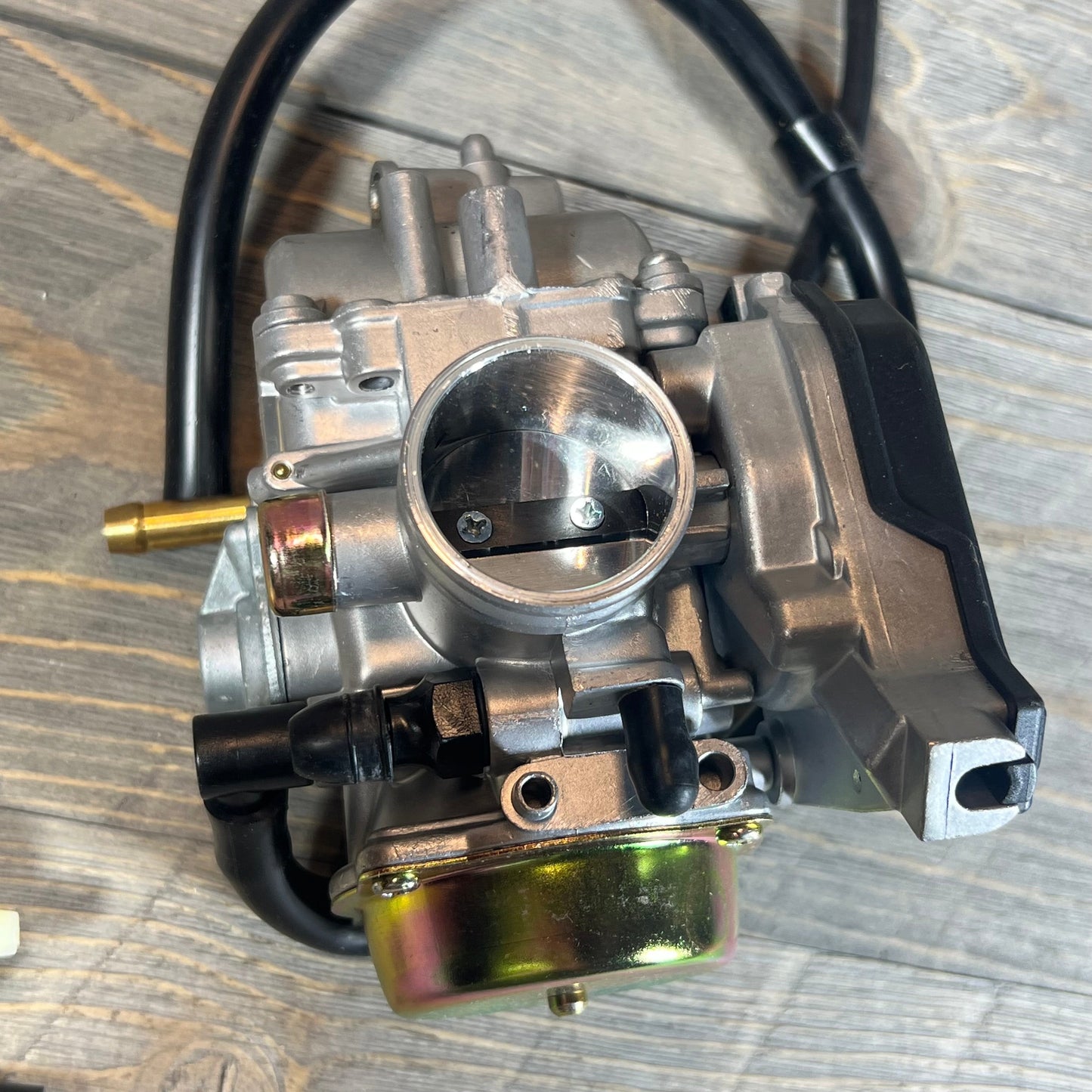 Carburetor for Suzuki Eiger 400 LTF400 Manual 2002-2007, highlighting top view detailing and connections.