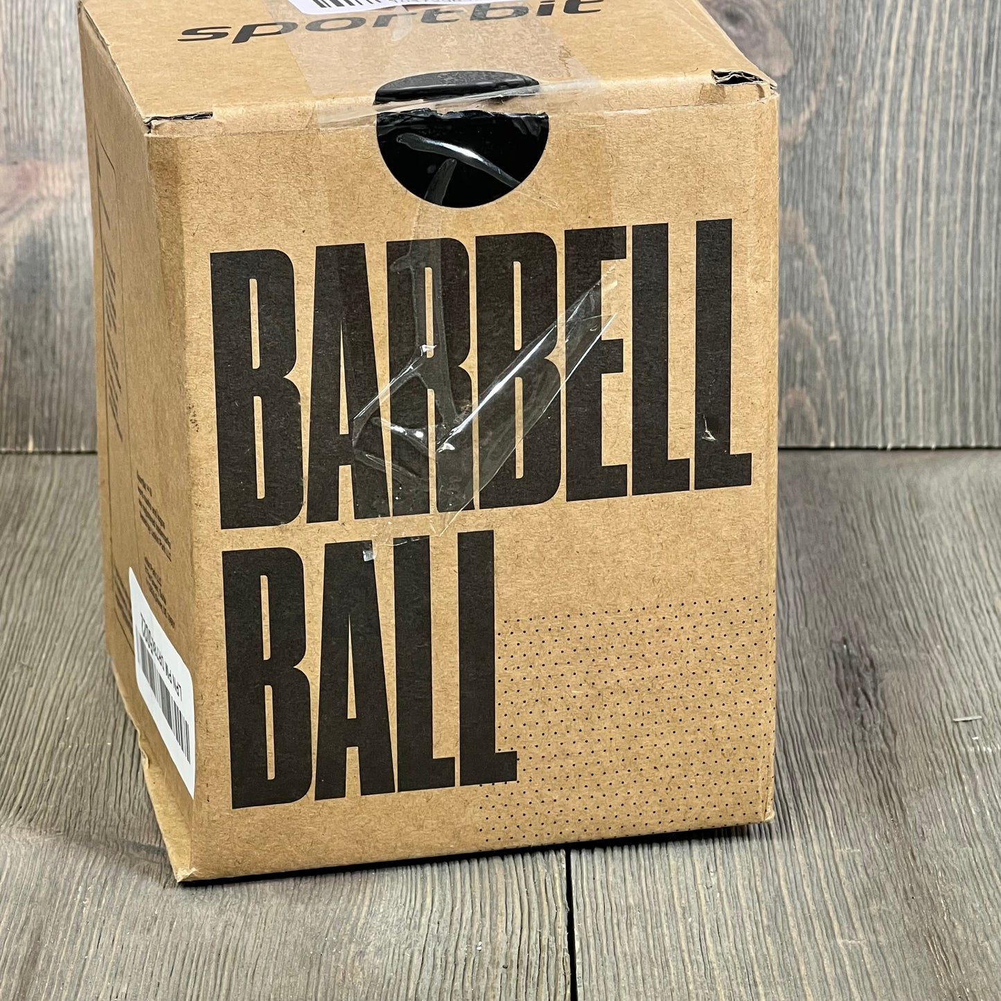 Sportbit packaging box for black landmine attachment, designed for 2” Olympic bars and 360° rotation. Ideal for strength workouts.