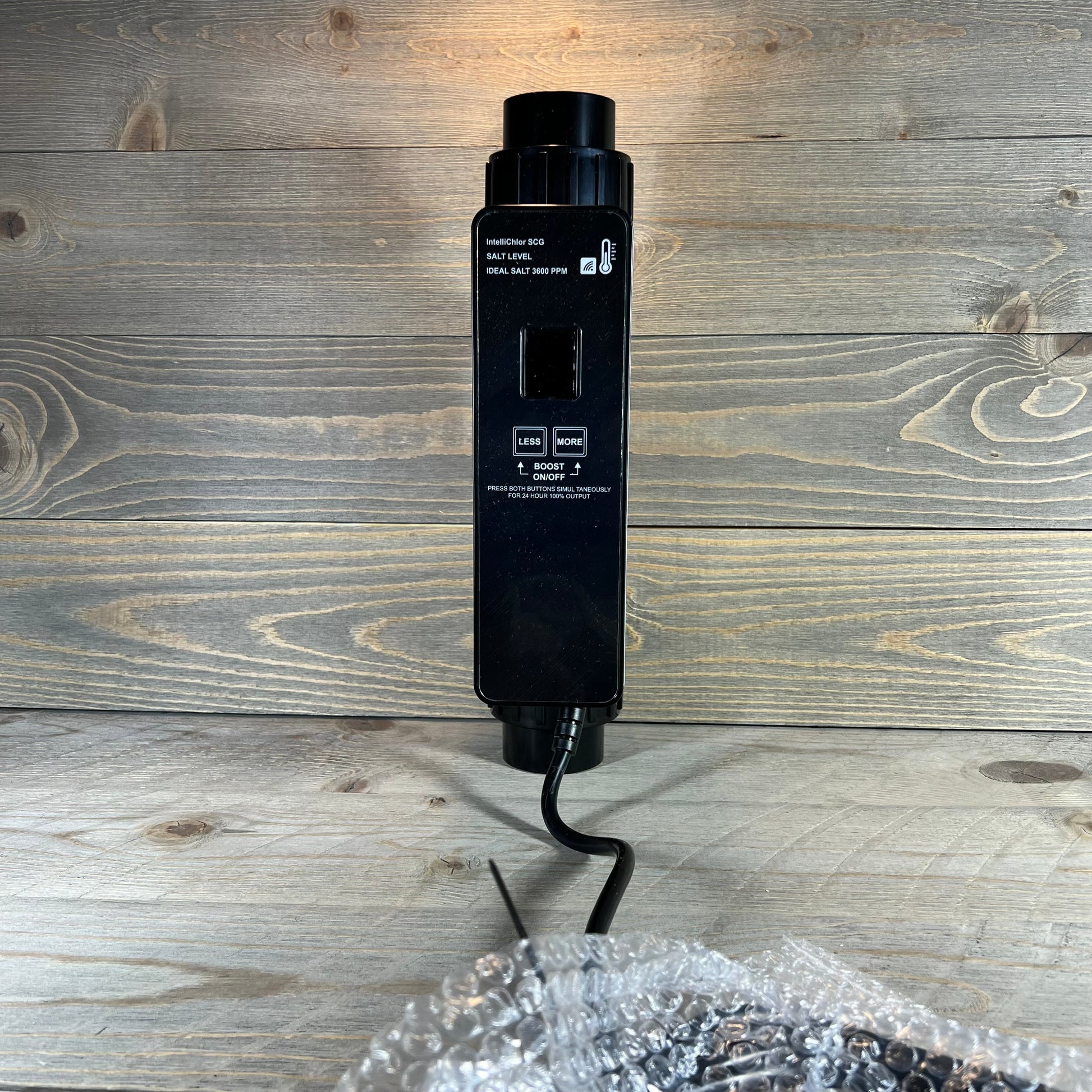 Chlorine generator replacement part for Pentair Intellichlor IC 15, shown on a wooden surface with cable detail.