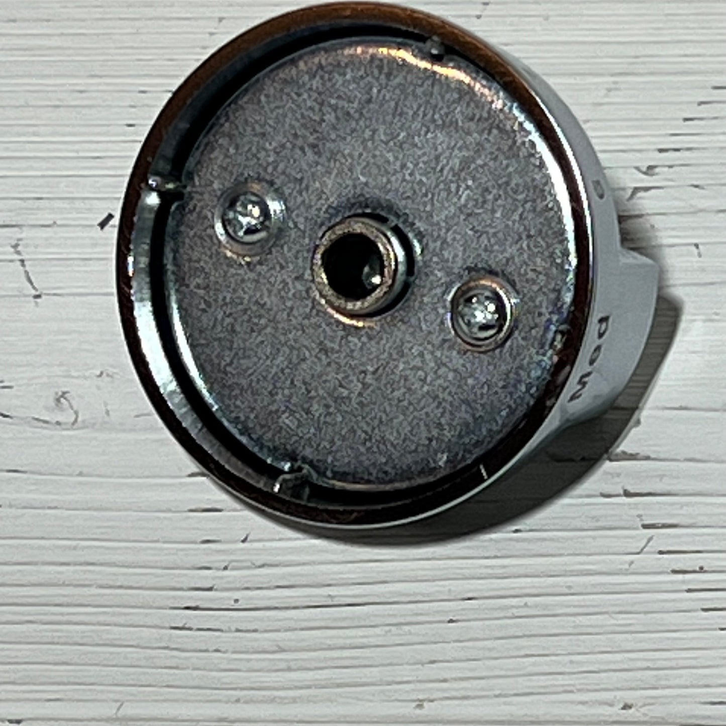 Stainless steel back of Samsung stove knob replacement, compatible with models NE63T8111SS/AA and NE63T8311SS/AA.