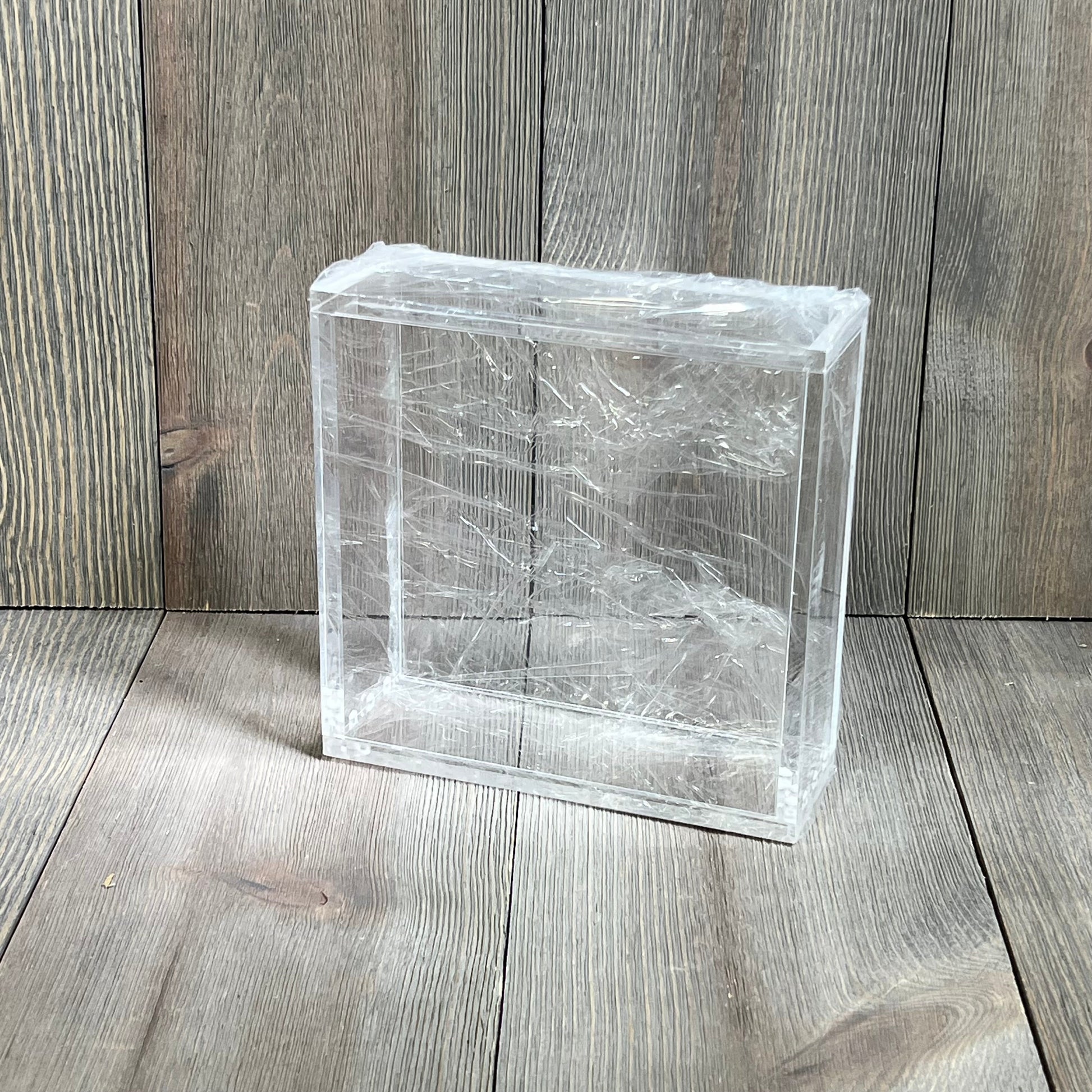 Clear acrylic magnetic case for TCG booster box, stackable with 4mm thick design, perfect for card collectors.