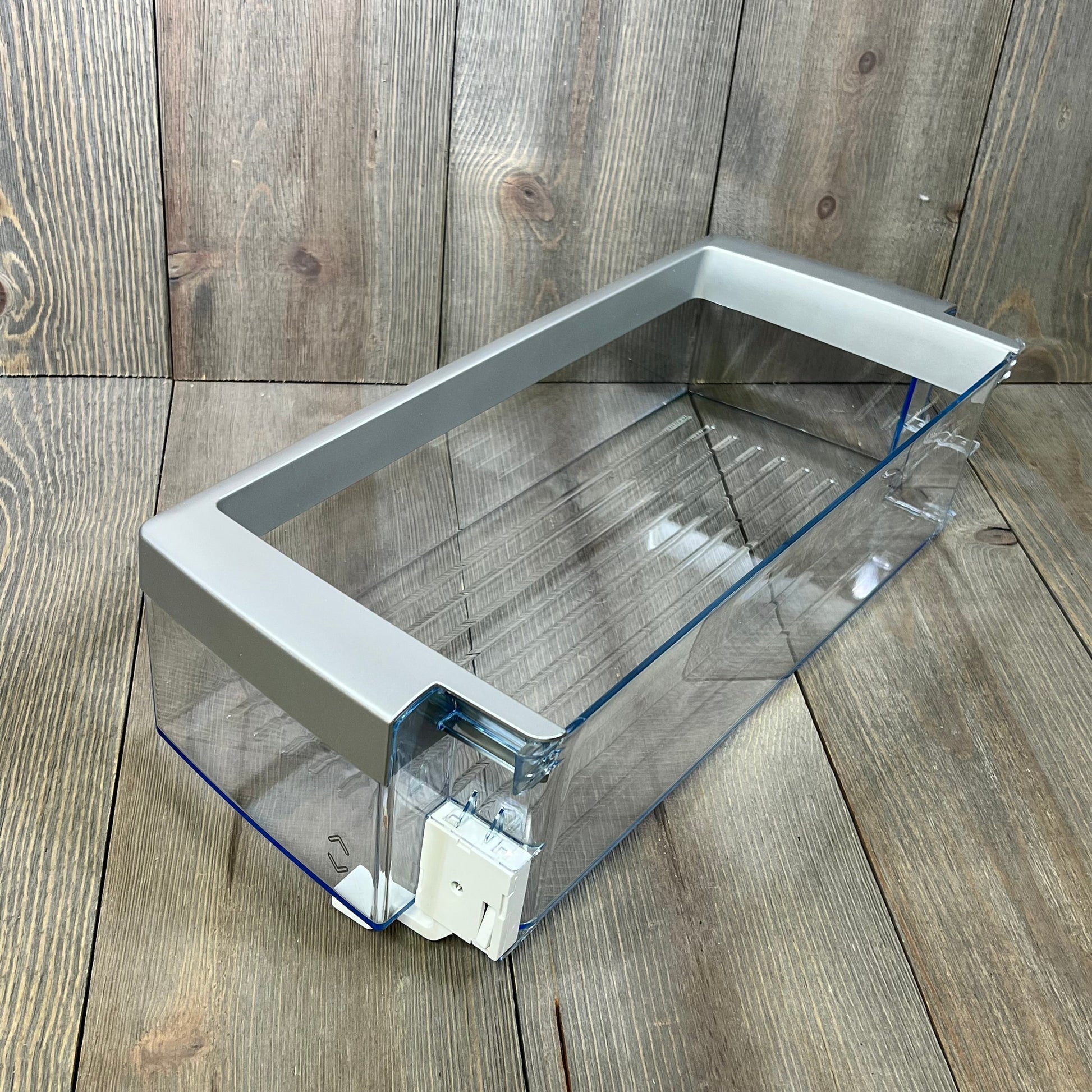 Clear plastic door shelf bin compatible with Bosch 00673122, designed for easy refrigerator organization.