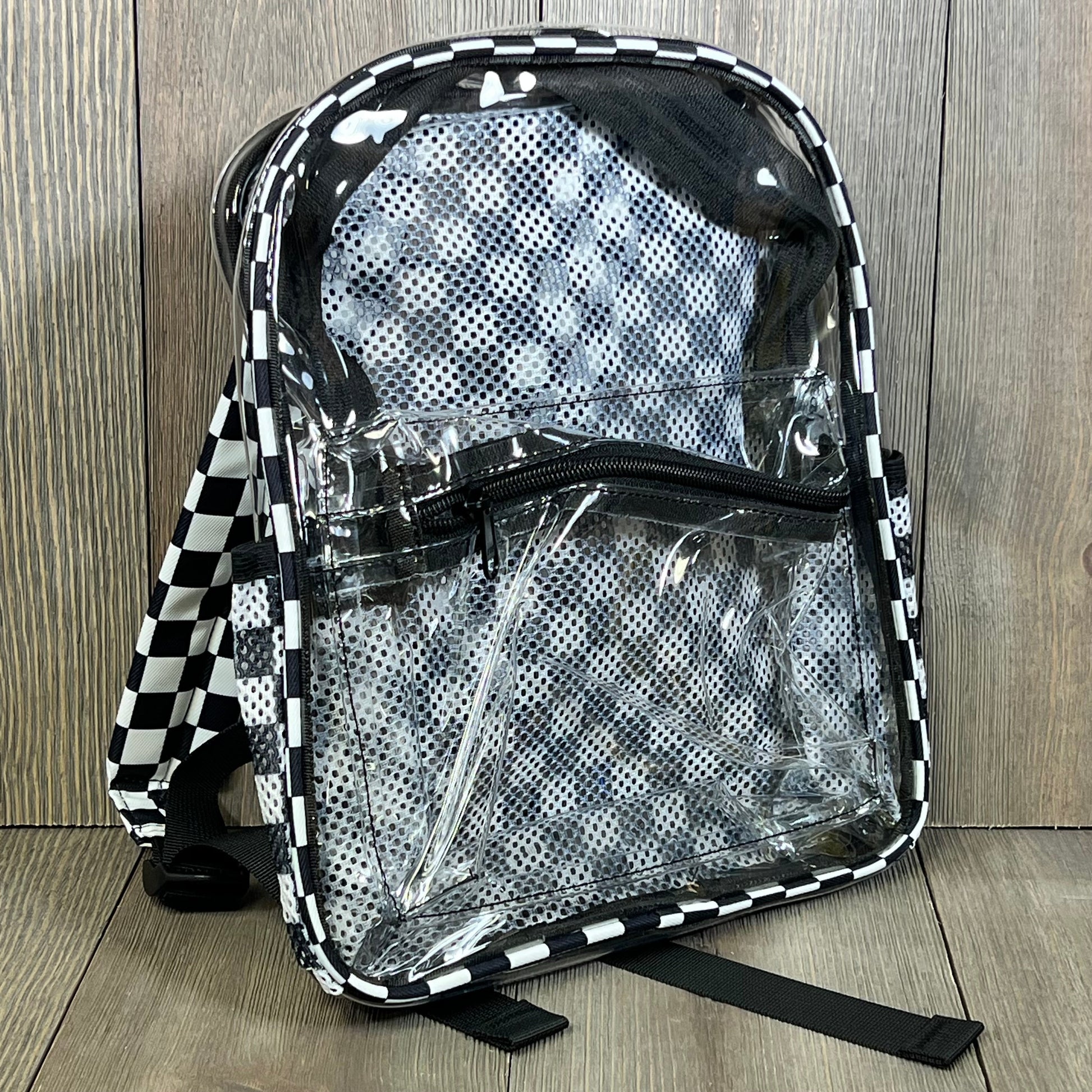 Clear mini backpack with checkered trim, perfect for stadium events. Transparent design, 12x12x6 inches for security checks.
