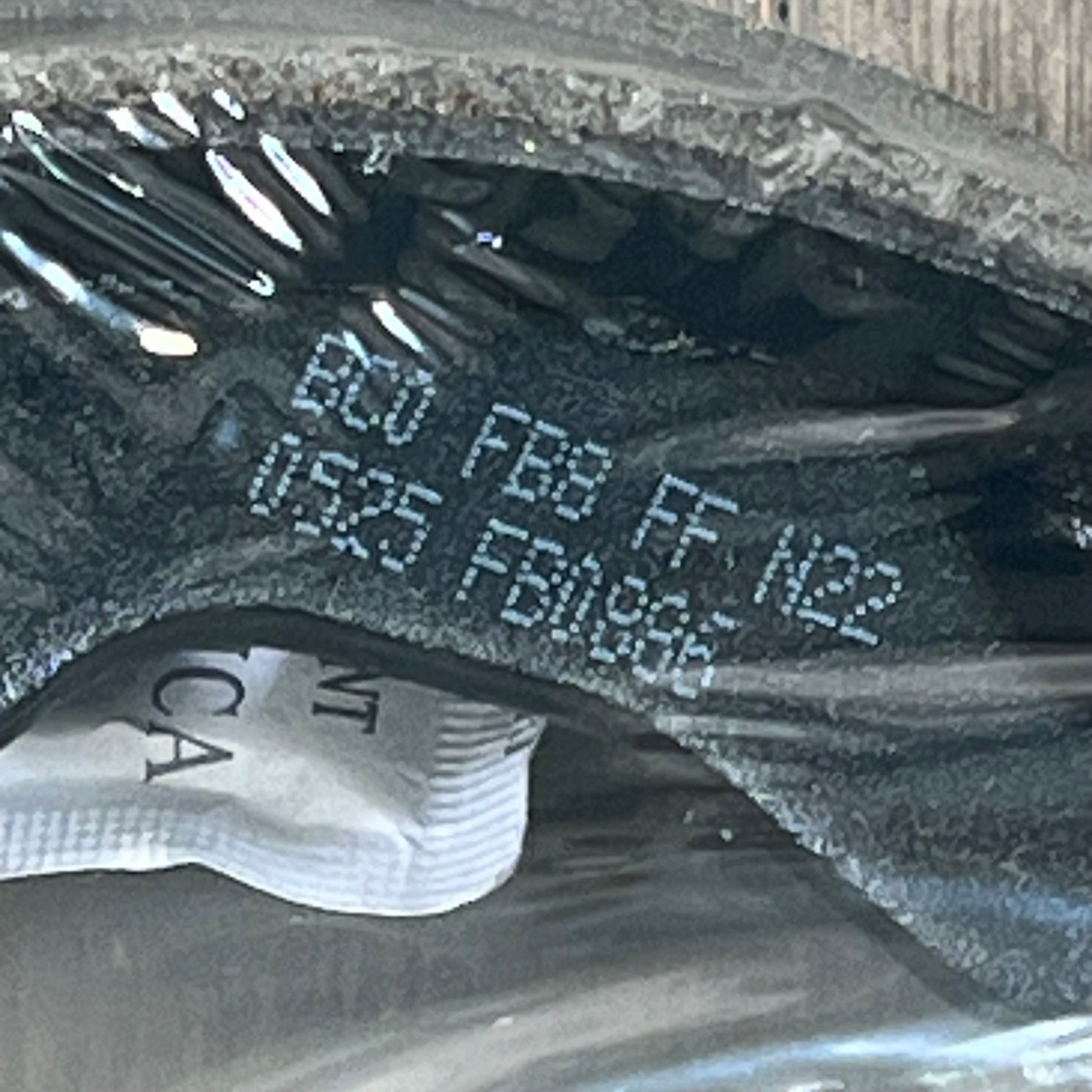 Close-up of BOSCH BS886 blue parking brake shoe set showing part number details, compatible with Chrysler, Dodge, Jeep, Mitsubishi.