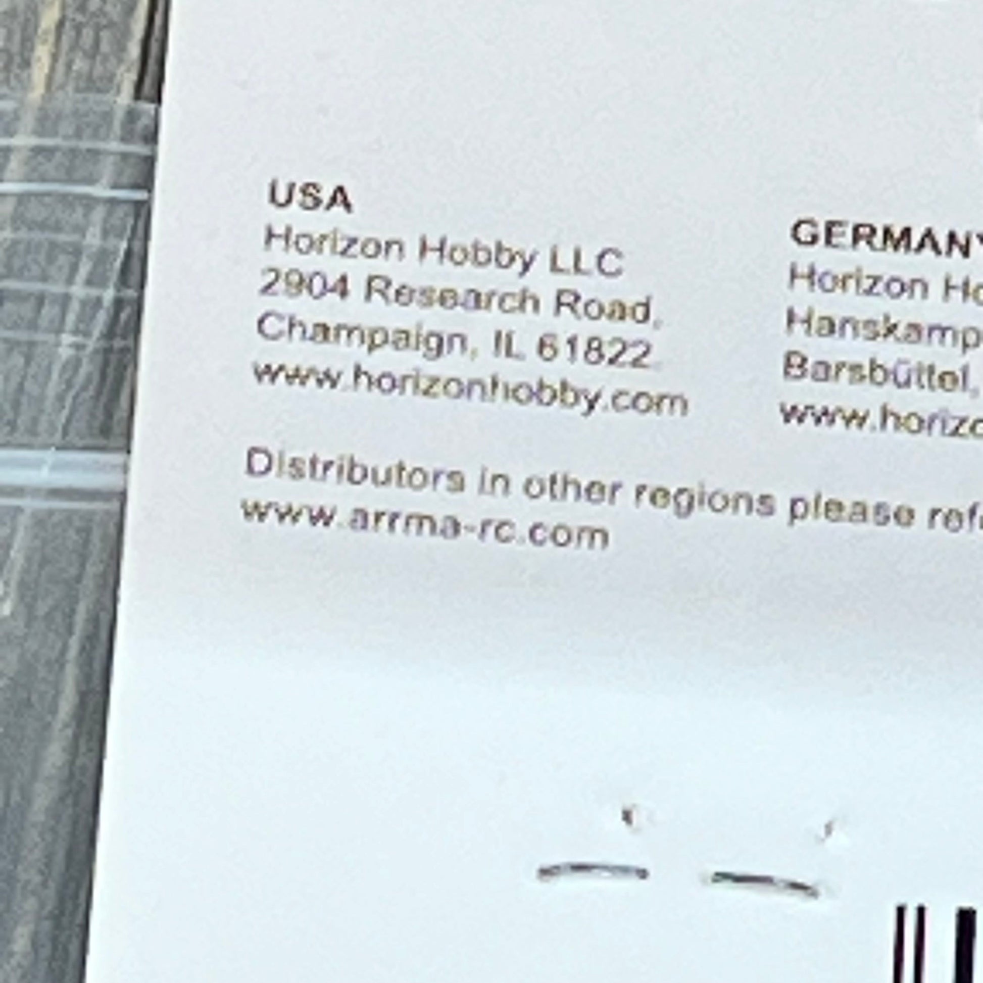 ARRMA 24mm Wheel Wrench packaging with distributor details for Horizon Hobby, showcasing contact information.