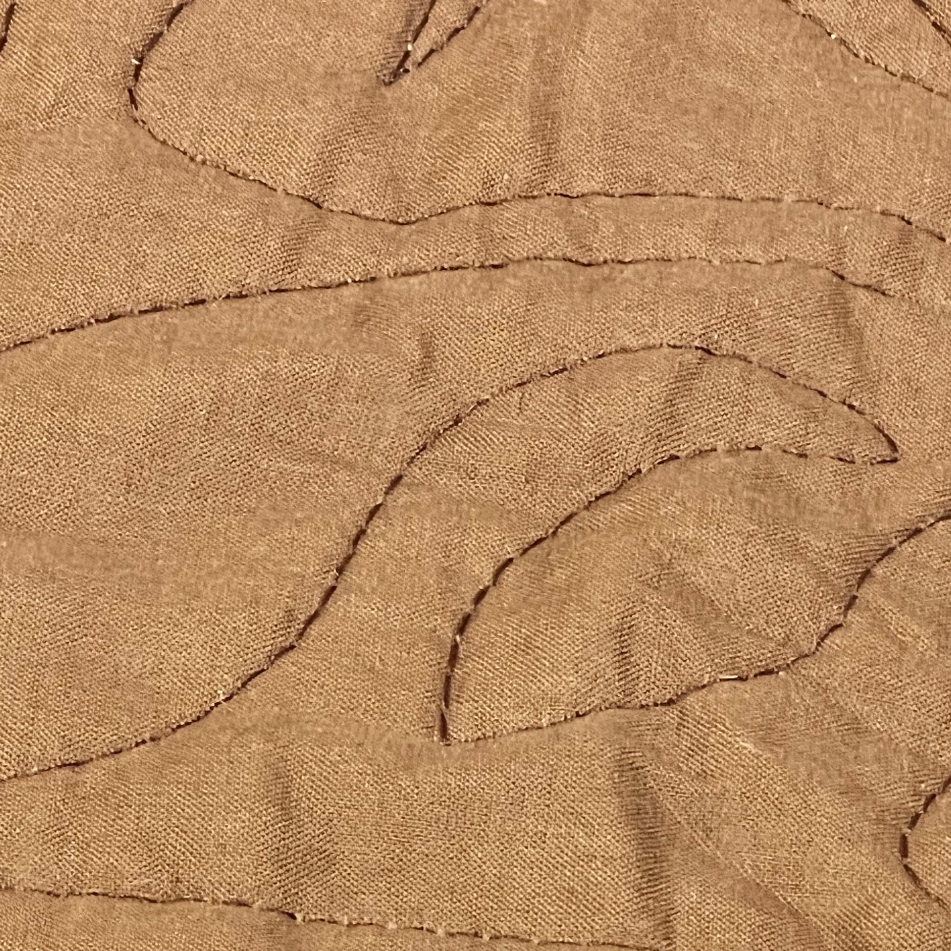 Quilted coffee-colored cotton fabric with intricate stitching on WINLIFE Euro Sham Cover, soft and breathable.