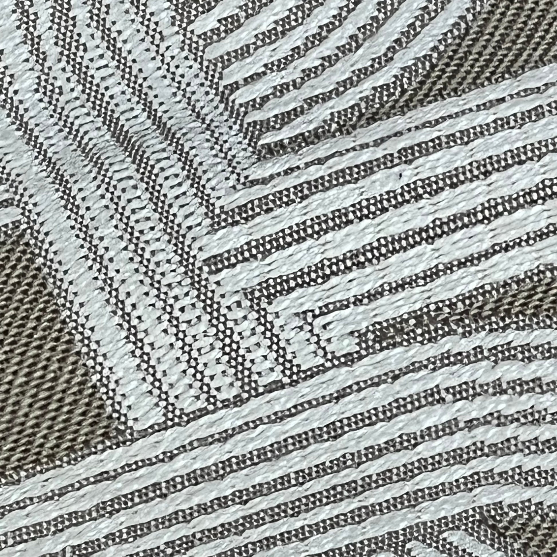 Close-up of chenille jacquard embroidery with pig nose pattern on luxury Croker Horse 18x18'' throw pillow cover.