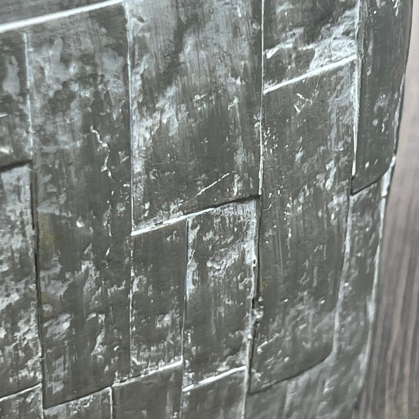 Close-up of textured gray decorative surface from Sweet Home Collection bathroom accessories set.