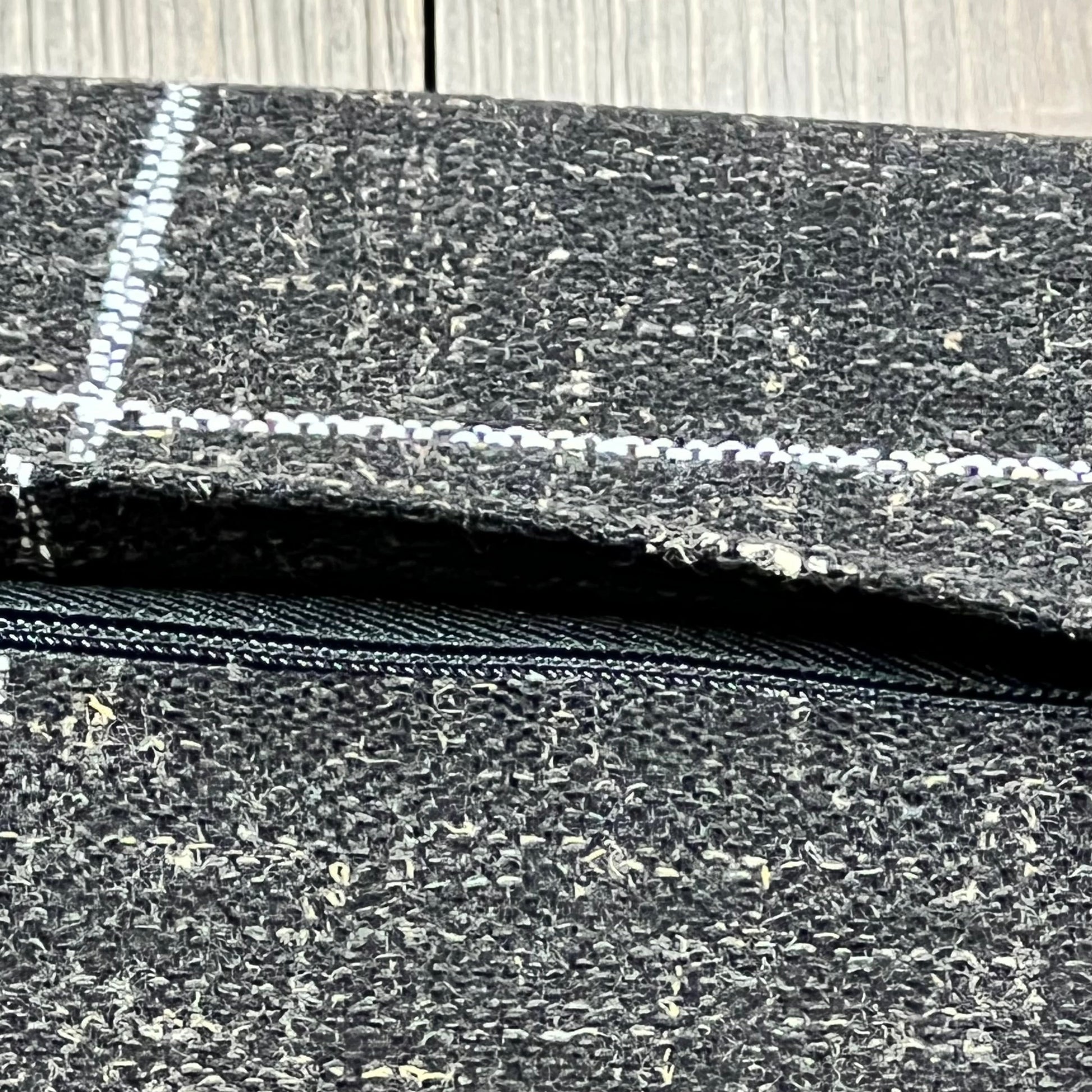 Close-up of black boho lumbar pillow cover with detailed texture and zipper, perfect for farmhouse decor.